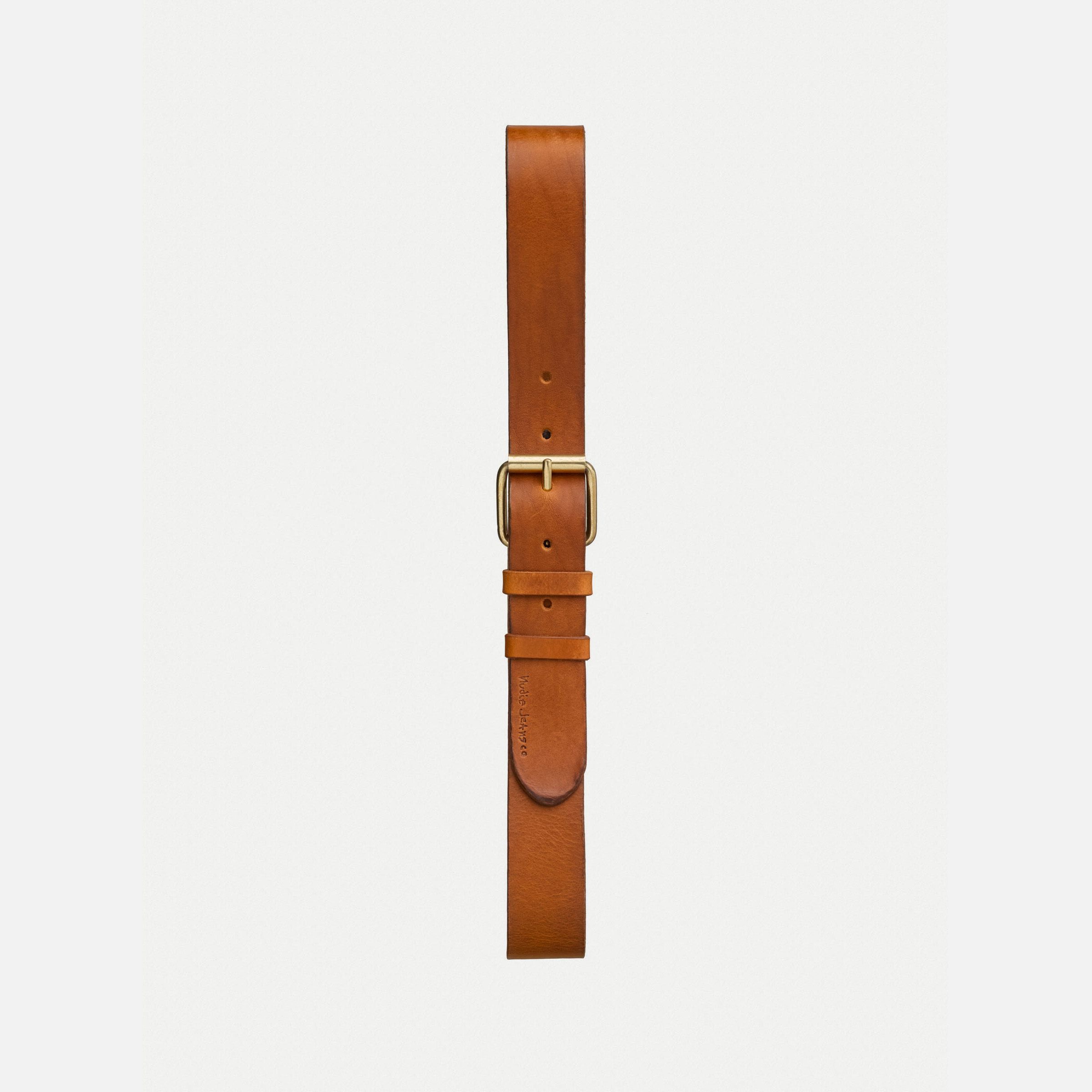 Nudie Jeans Pedersson Leather Belt in Toffee Brown, a men's leather belt laid flat vertically against a white background.