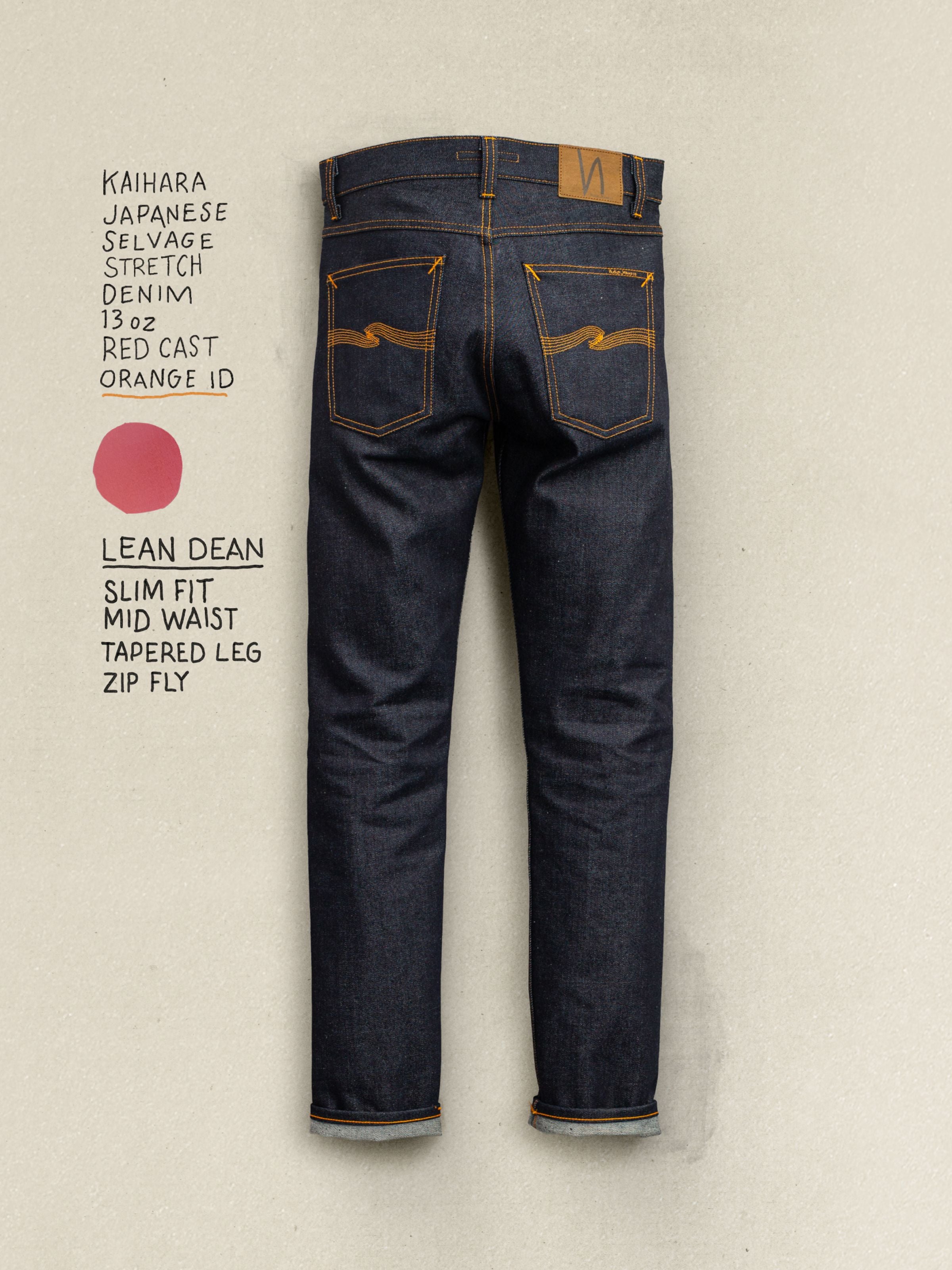 Nudie Jeans Lean Dean Dry Japan Selvage, men's slim tapered fit jeans shown from the back against a textured background.