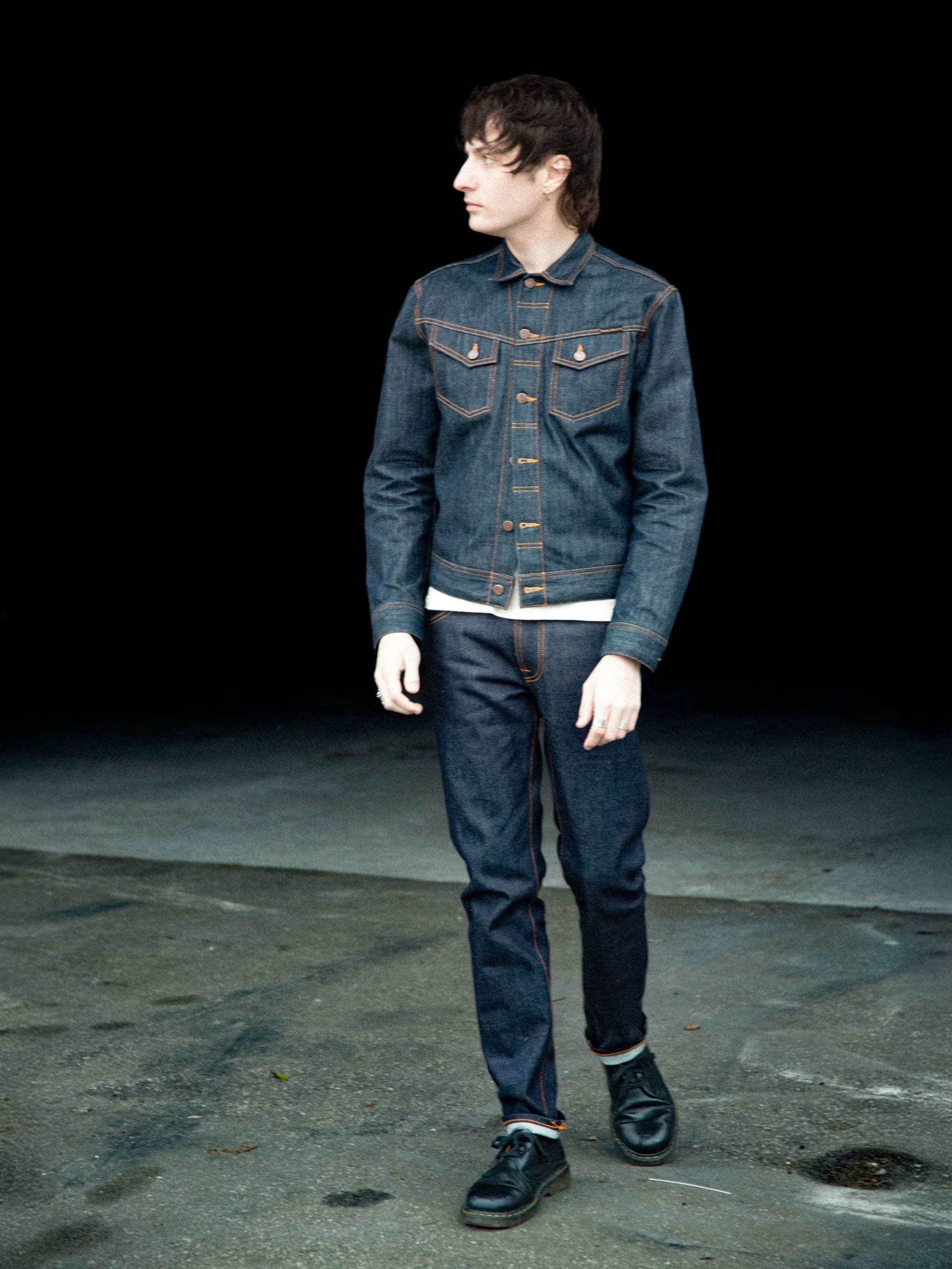 Nudie Jeans Lean Dean Dry Japan Selvage, men's slim fit jeans worn in a lifestyle shot with a matching jacket.