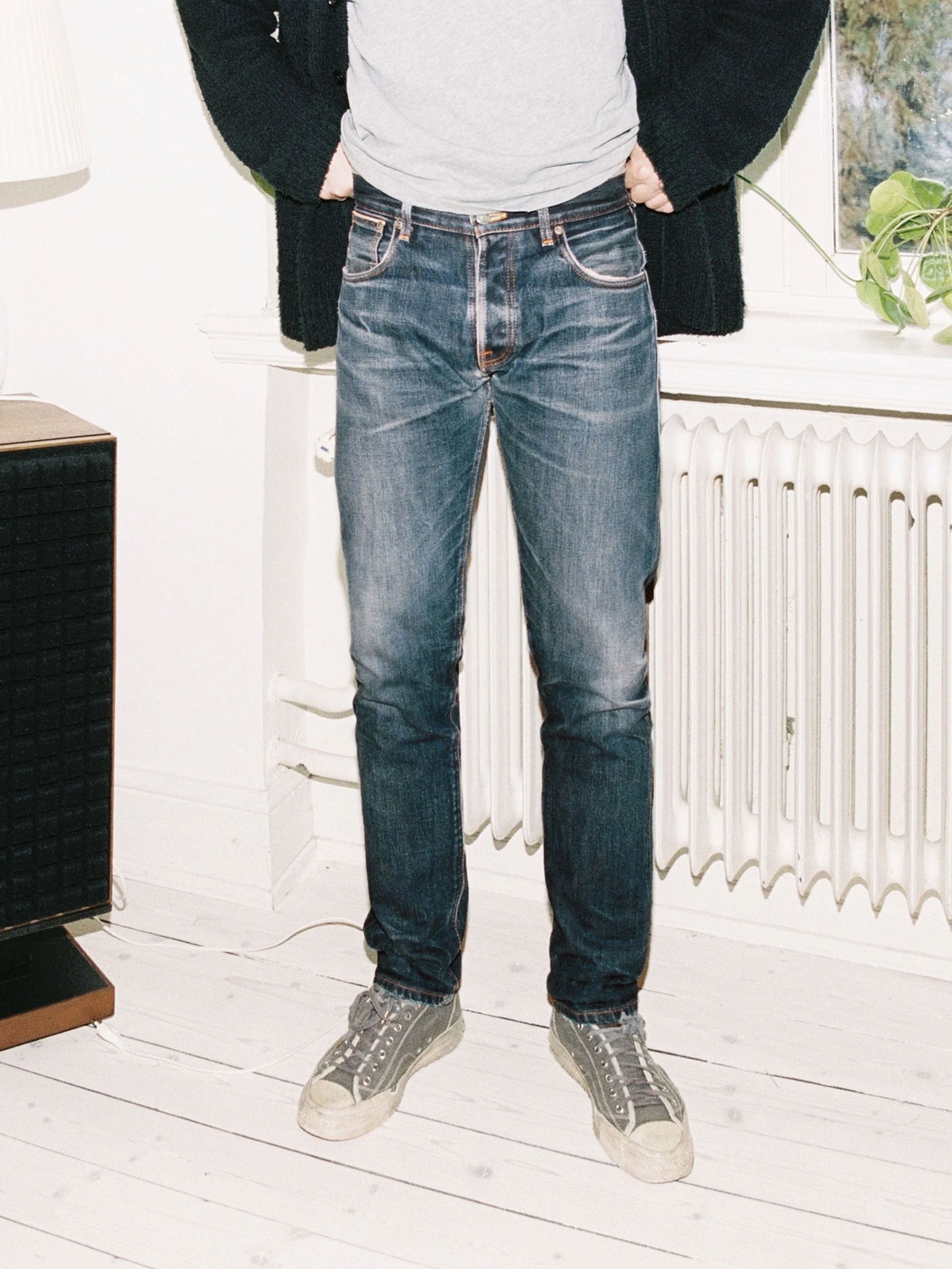 Steady Eddie II Dry Selvage, men's regular tapered fit jeans in blue selvedge denim, worn in a lifestyle setting.