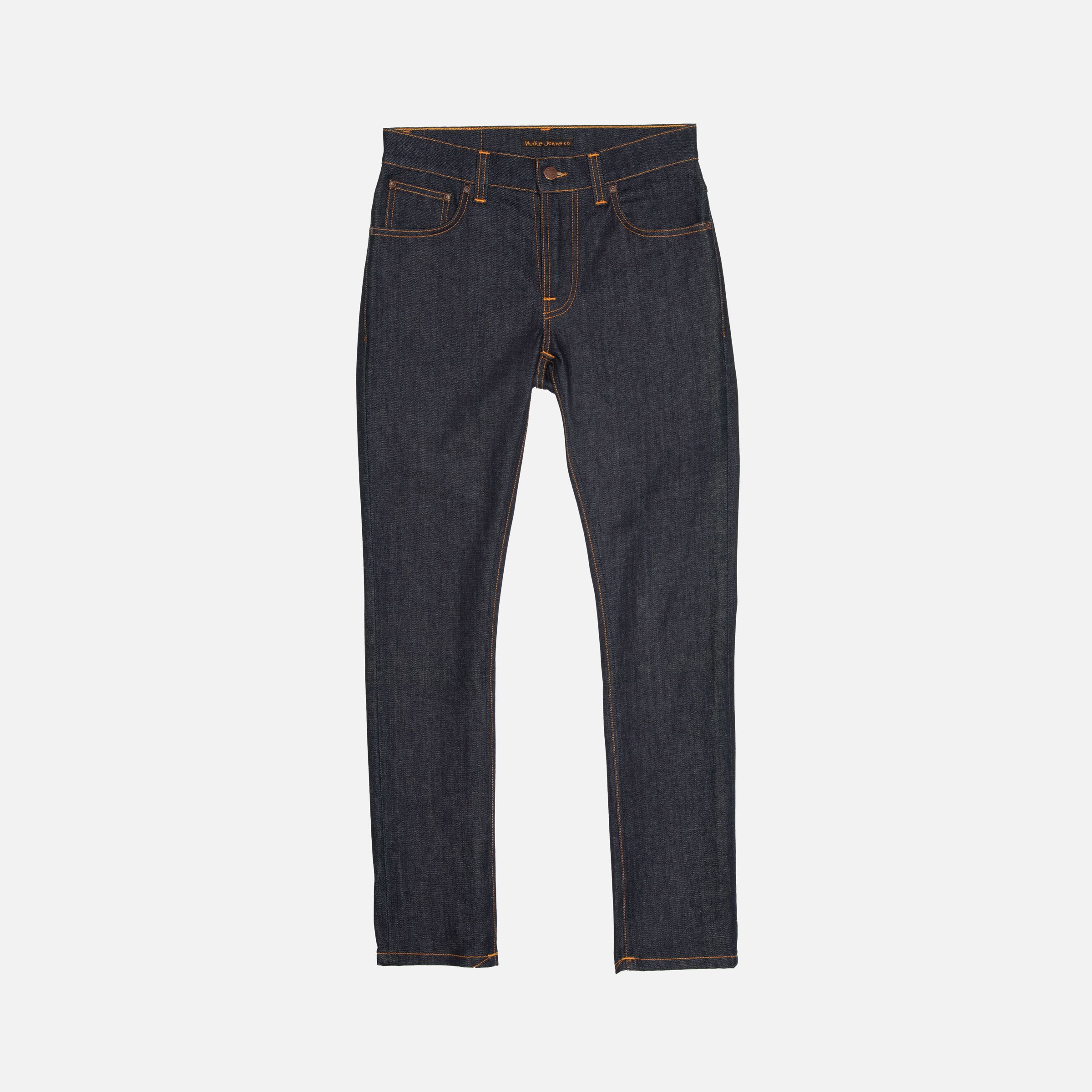 Nudie Jeans Grim Tim in Dry True Navy, a pair of men's slim fit jeans shown laid flat.