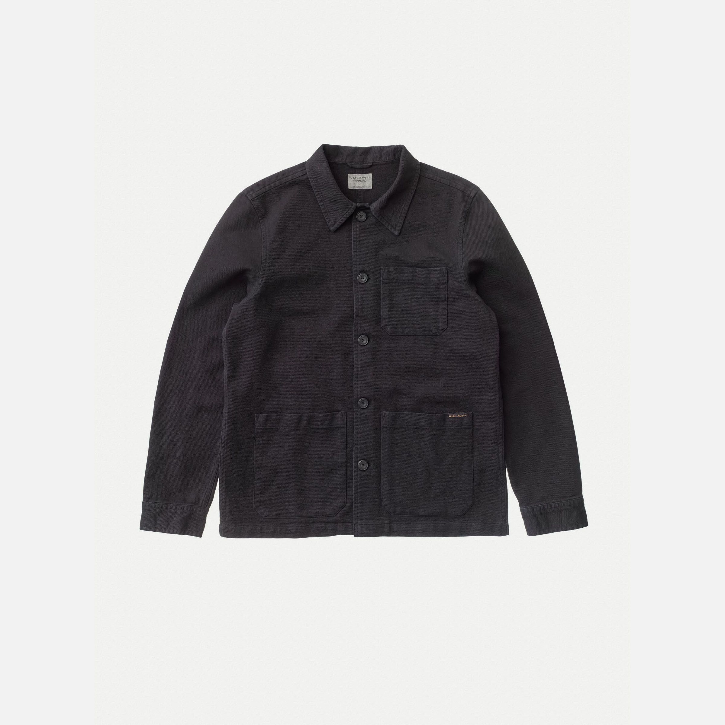 Nudie Jeans Barney Worker Jacket in Black, a men's regular fit jacket shown laid flat against a white background.