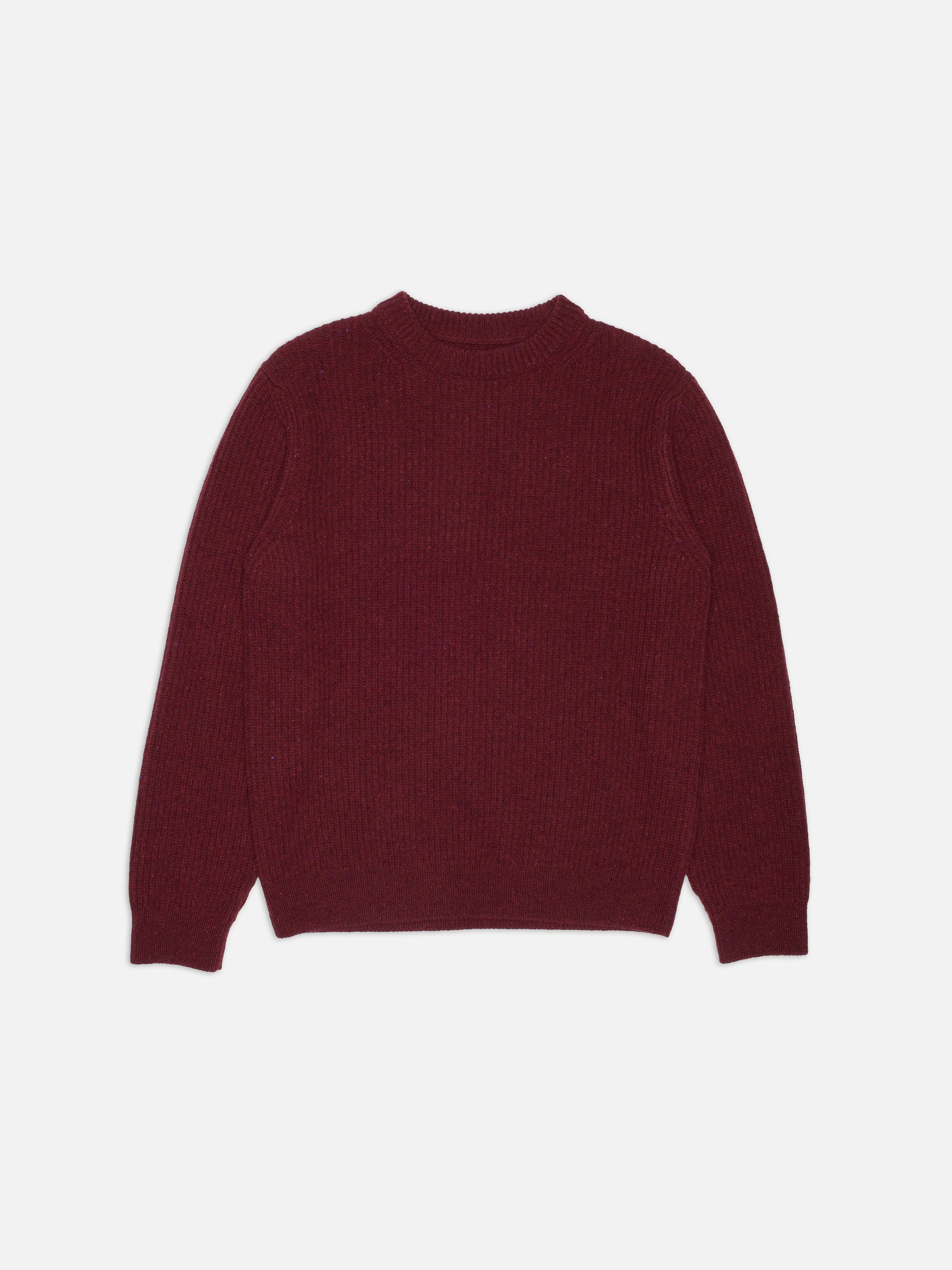 Nudie Jeans August Rib Wool Sweater in Burgundy, a crew-neck rib knit made with organic wool, shown in a flat shot.