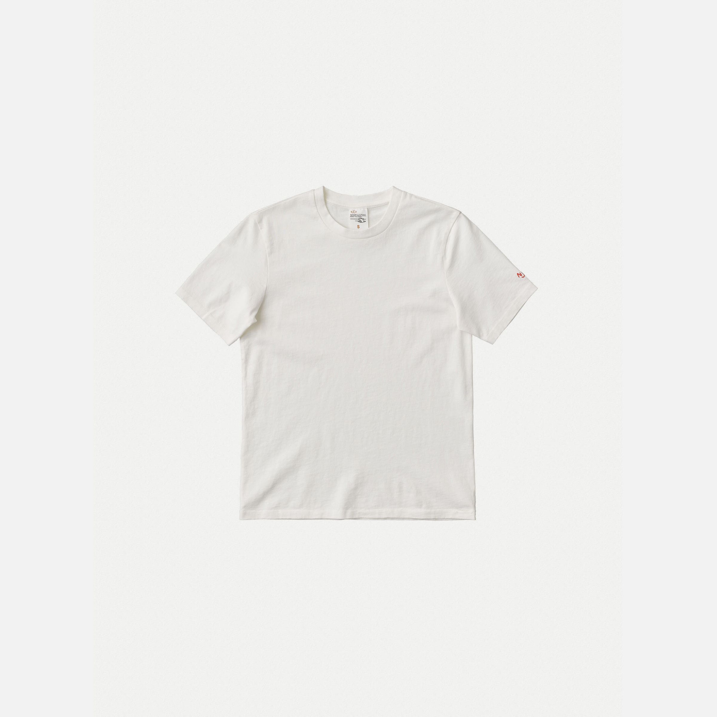 Nudie Jeans Joni Solid T-shirt in Offwhite, a women's regular fit t-shirt shown laid flat against a white background.