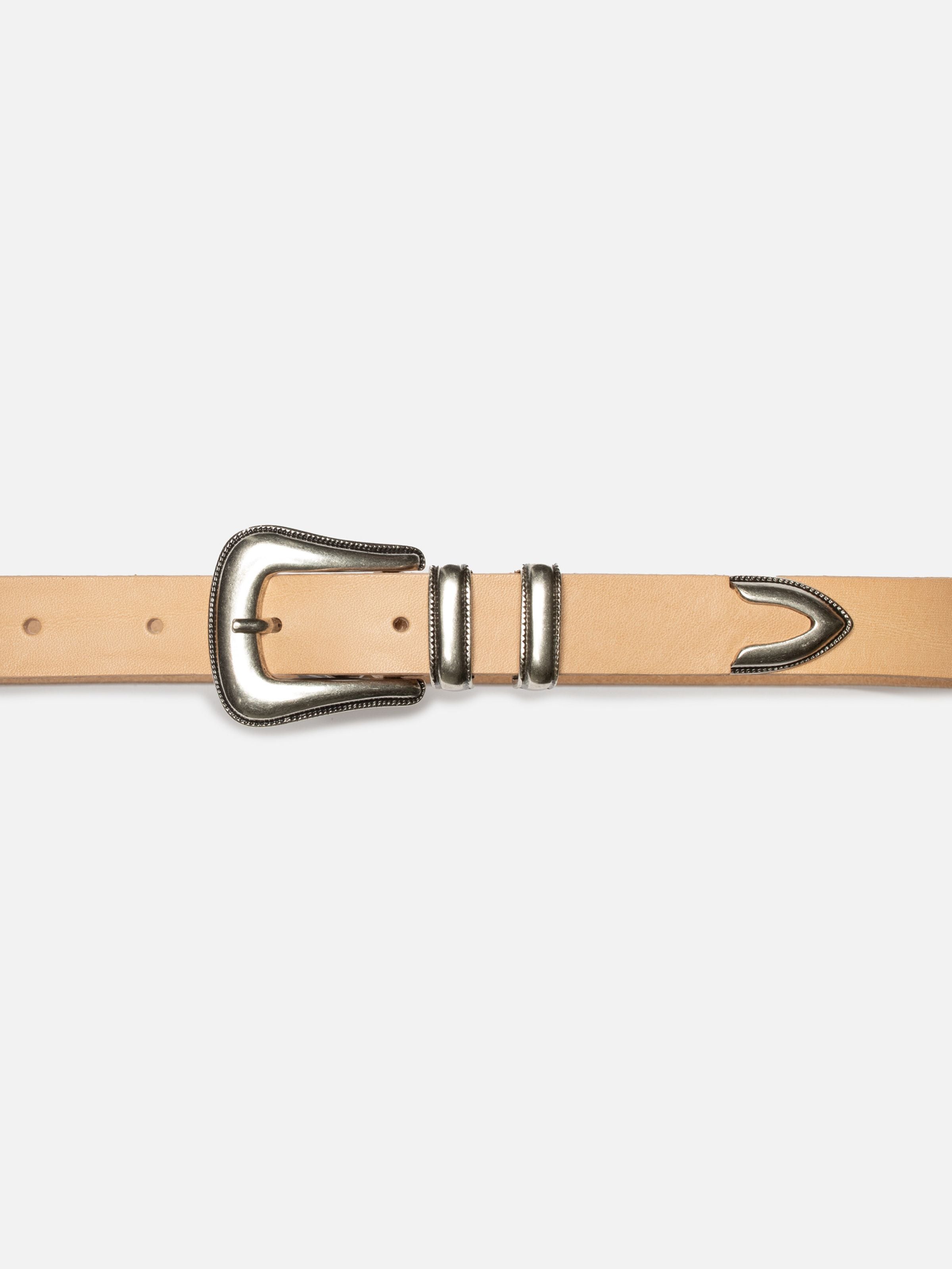Nudie Jeans Western Silver Belt in Natural, close-up view of the decorative silver buckle, loops, and tip.