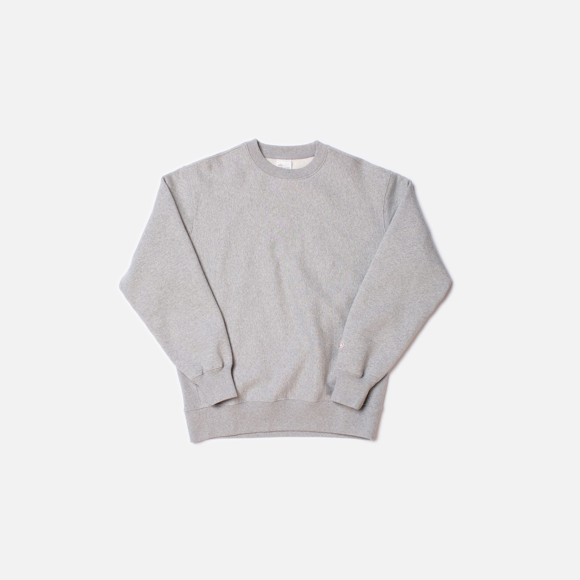 Nudie Jeans Hasse Crew Neck Sweatshirt in Greymelange, a men's regular fit sweatshirt shown laid flat.