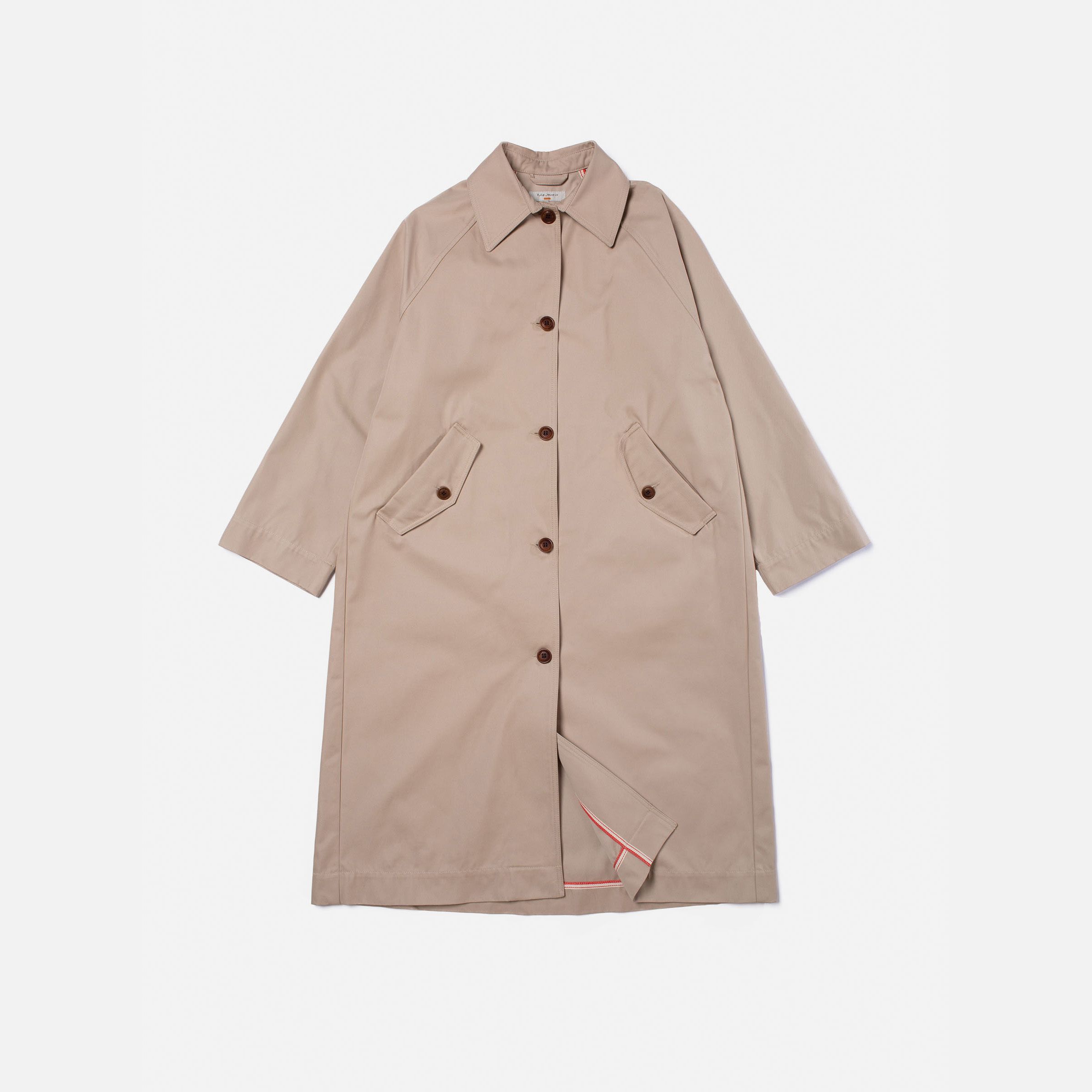 Nudie Jeans Ester Coat Beige, a women's loose-fit coat in beige, shown laid flat.