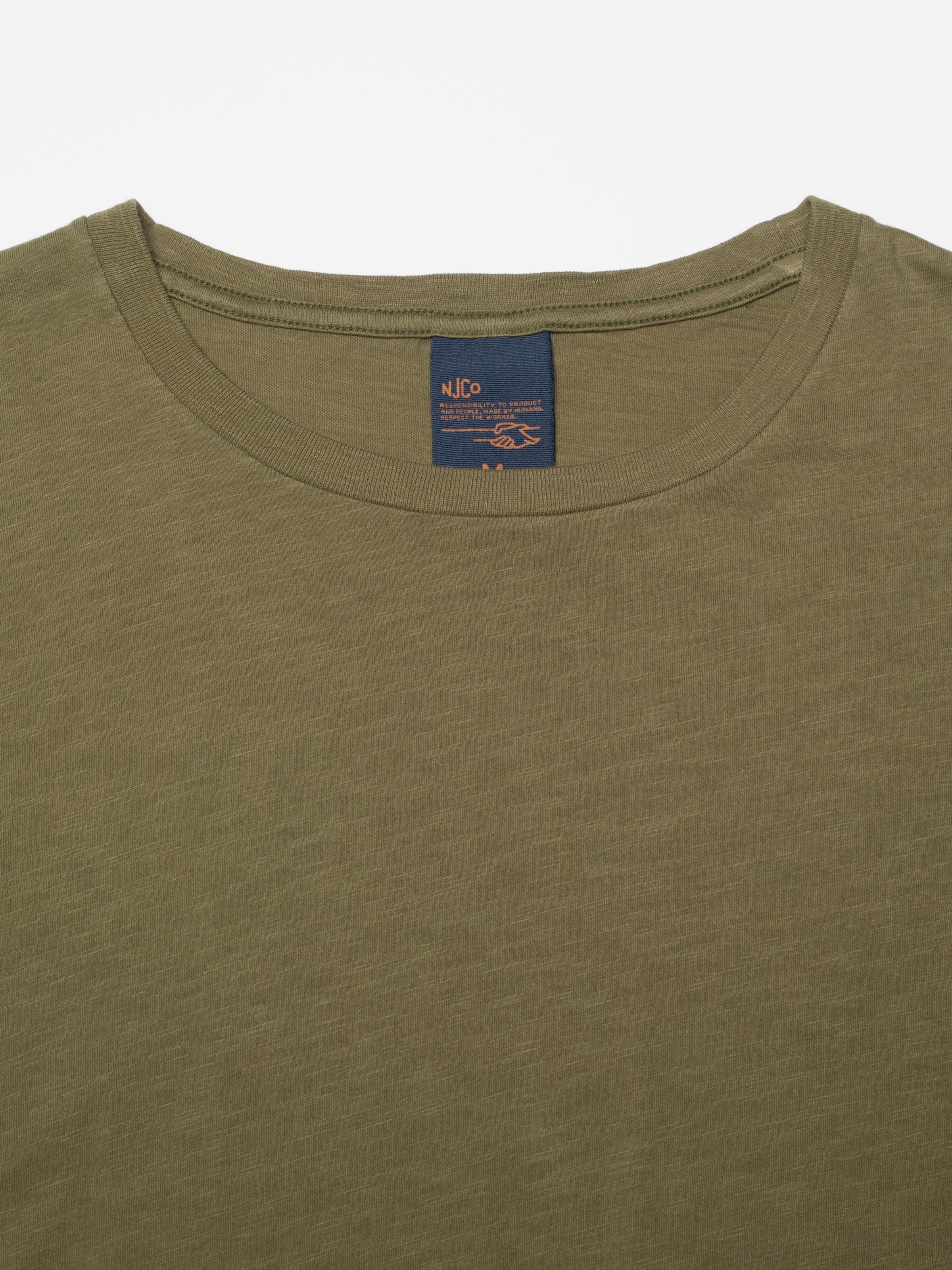 Nudie Jeans Roffe Slub T-Shirt in Olive Green, showing a close-up of the neck and organic cotton jersey texture.