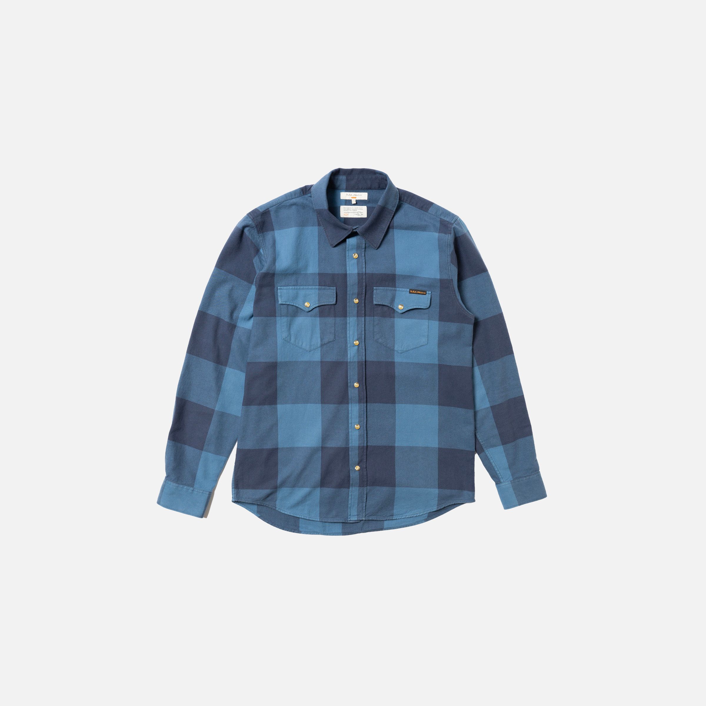 Nudie Jeans George Flannel Shirt in Blue, a men's regular fit checked shirt in organic cotton, shown laid flat.
