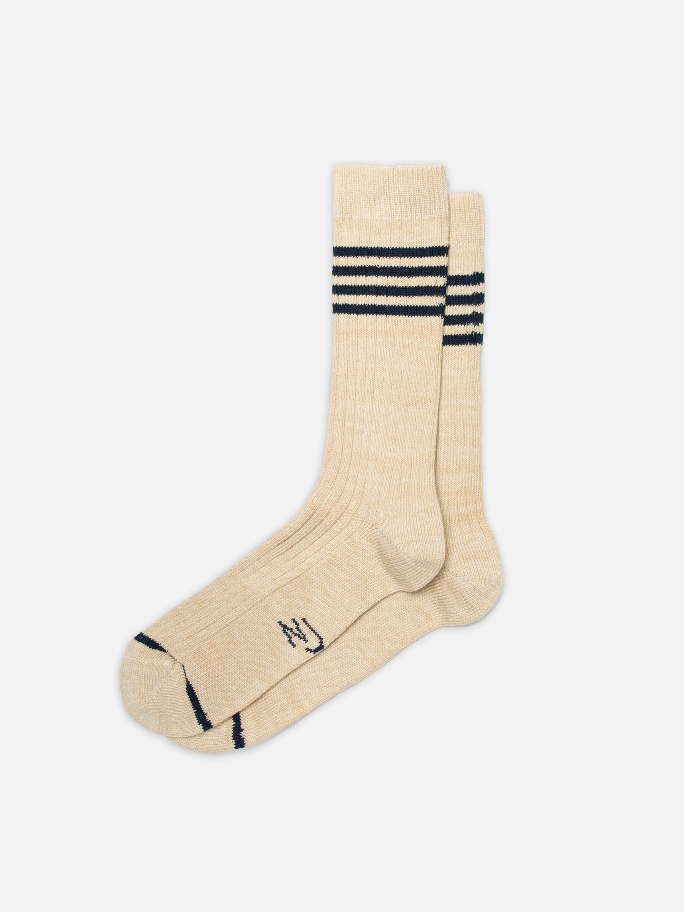 Nudie Jeans Men Tennis Socks Stripe Blue/Beige, organic cotton socks in beige with blue stripes shown as a flat shot.