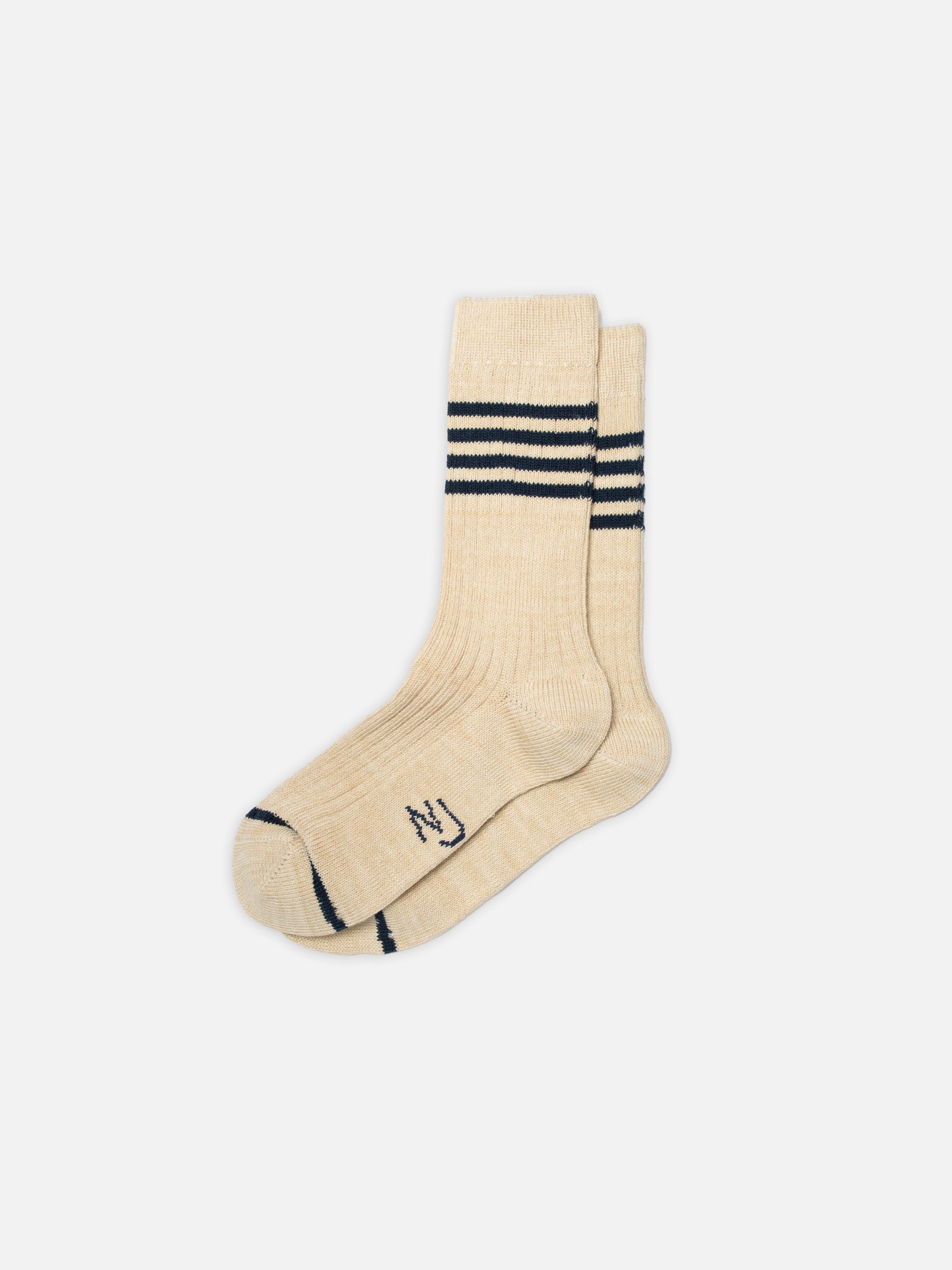 Nudie Jeans Women Tennis Socks Stripe, a pair of women's tennis socks in beige with blue stripes, shown laid flat.
