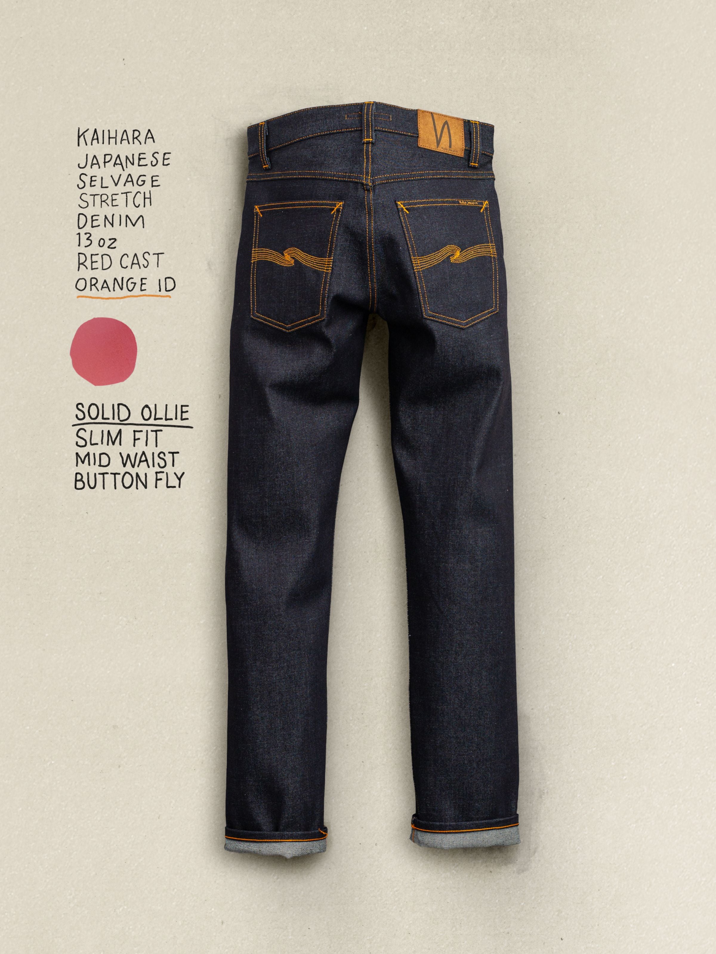 Nudie Jeans Solid Ollie Dry Japan Selvage, slim fit jeans shown in full back view highlighting raw selvedge denim.