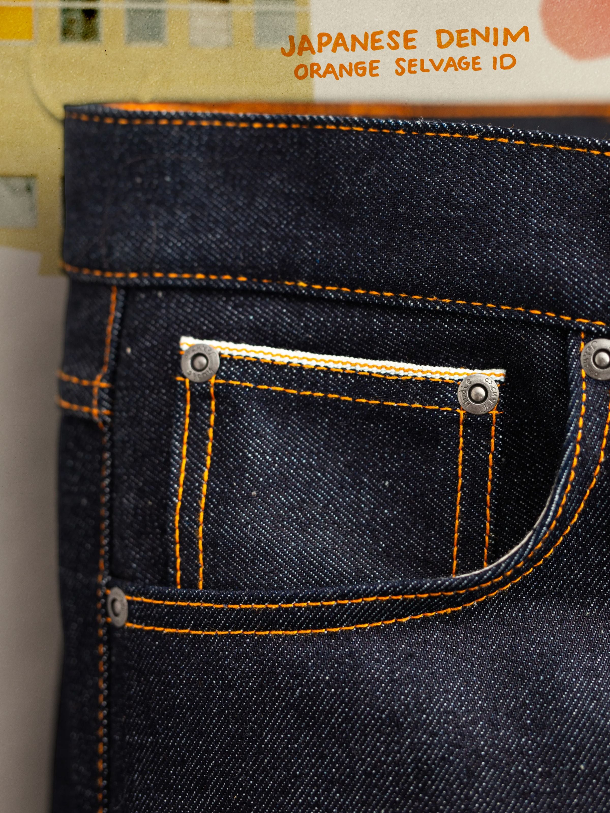 Nudie Jeans Solid Ollie Dry Japan Selvage, slim fit jeans, showing a close-up of the front coin pocket and selvedge detail.