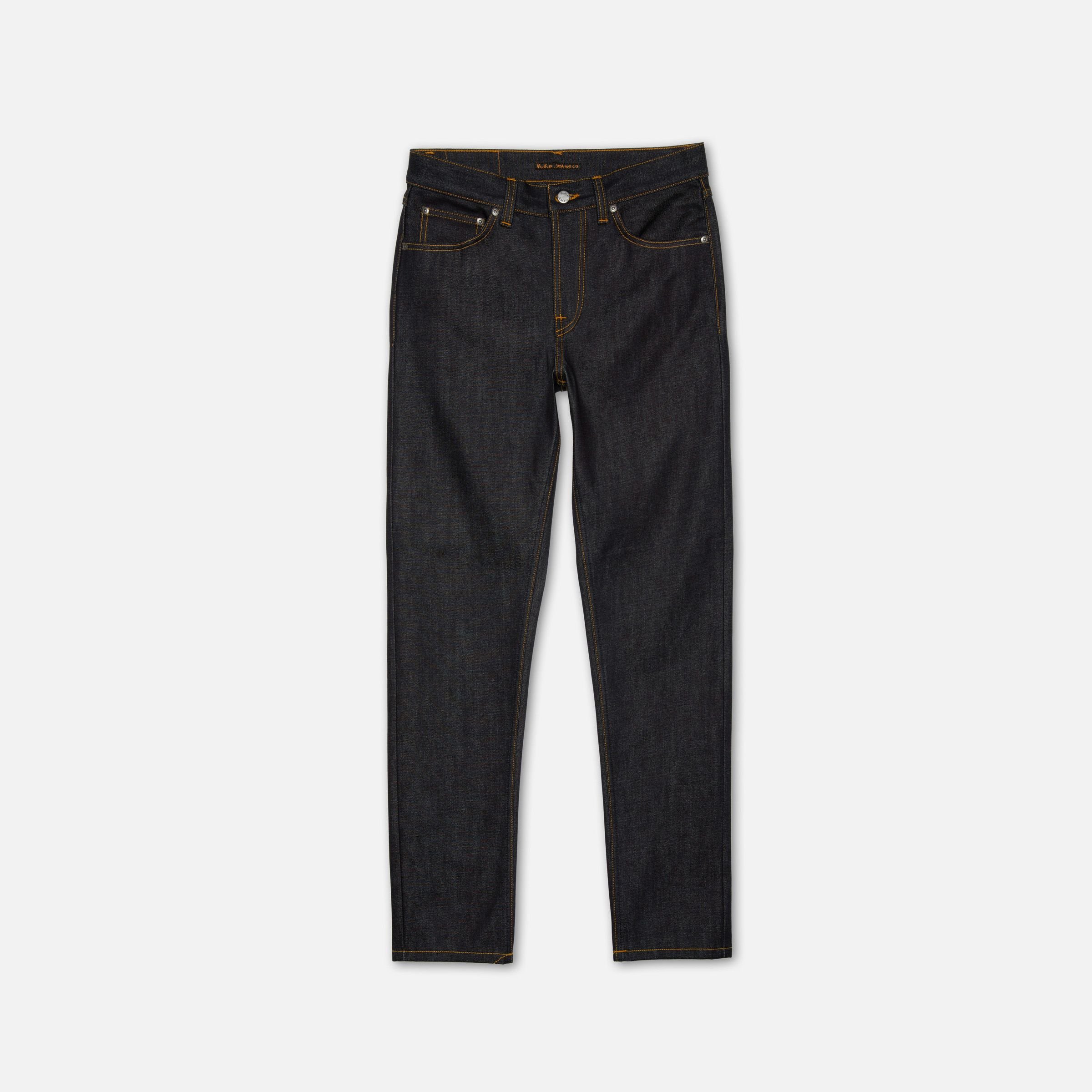Nudie Jeans Steady Eddie II Dry Deluxe, a pair of men's regular tapered fit jeans in dry deluxe denim, shown laid flat.