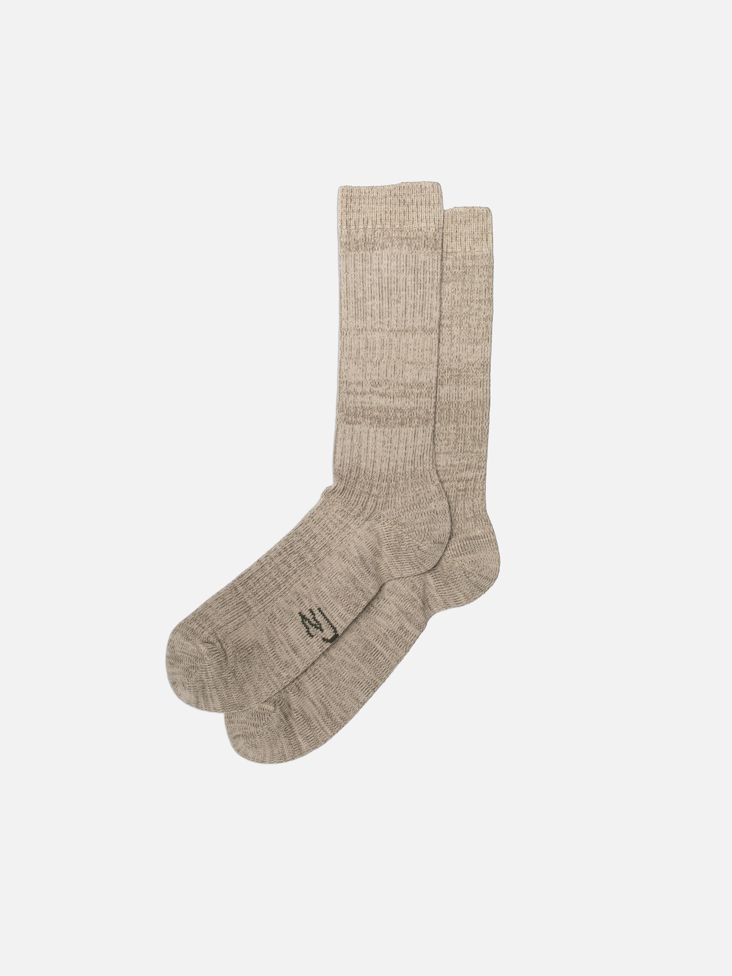 Nudie Jeans Rasmusson Mens Rib Sock in Offwhite, midweight ribbed organic cotton socks featuring an NJ logo on the sole.