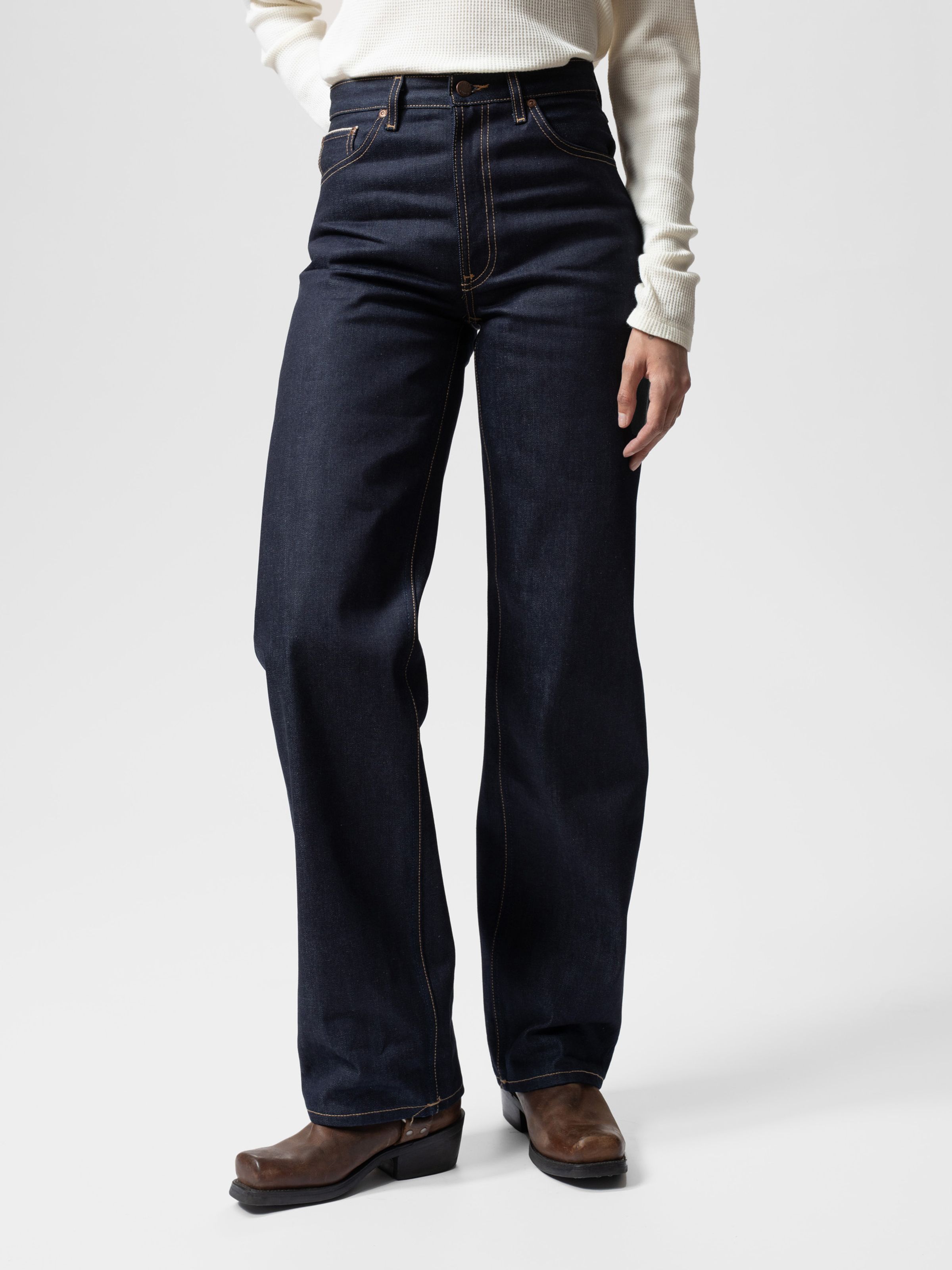 Nudie Jeans Clean Eileen Dry Twilight Selvage, women's high-waist wide-leg blue jeans shown on a model from the waist down.
