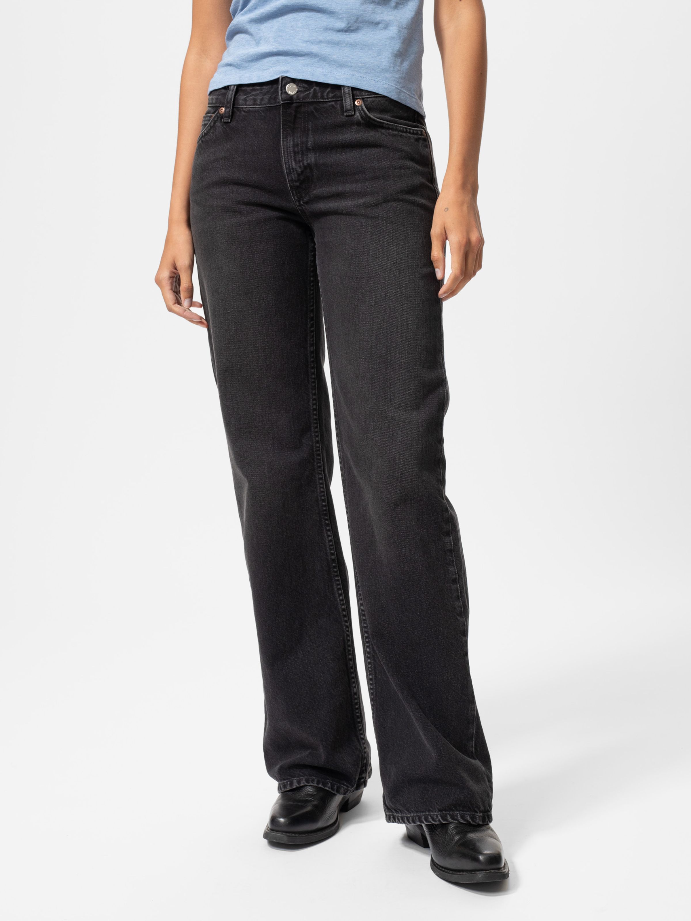 Nudie Jeans Wide Heidi Slow Black, women's loose-fit wide-leg jeans in a washed black denim shown on a model.
