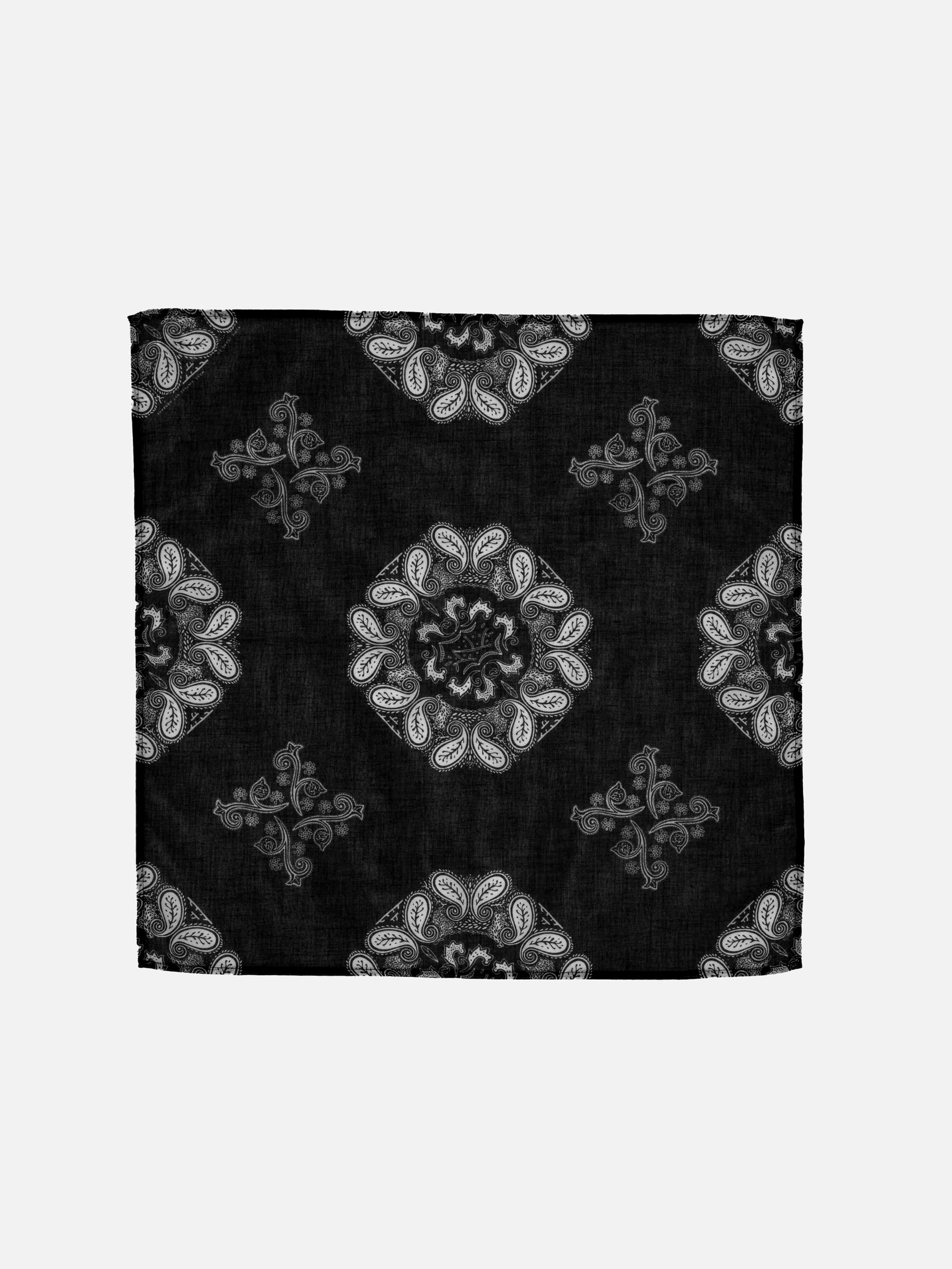 Nudie Jeans Ingrid Bandana in Paisley Black, an organic cotton bandana with an all-over white paisley print, shown laid flat.