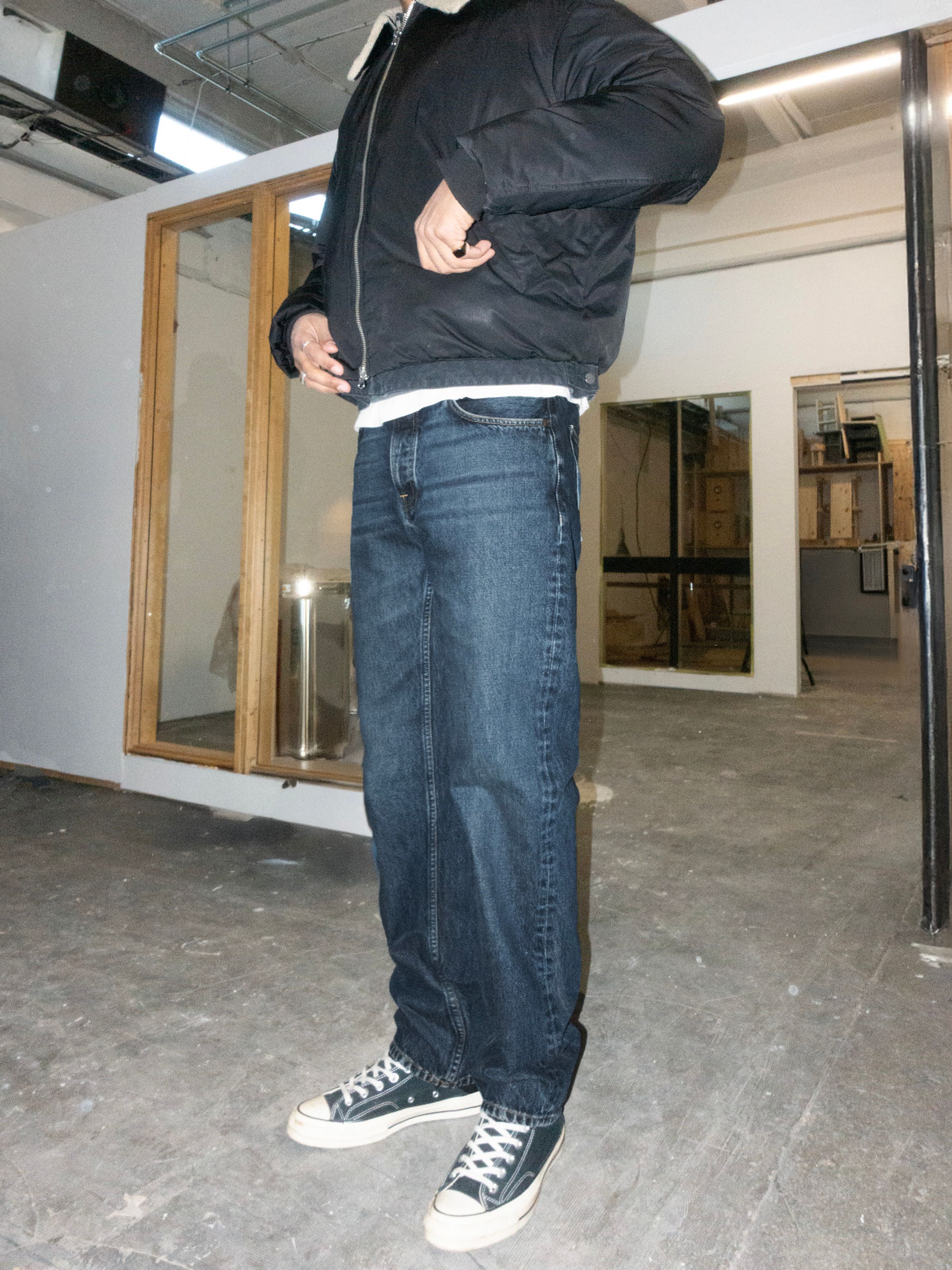Nudie Jeans Rad Rufus Blue Soil, men's regular fit straight leg jeans shown on a model.