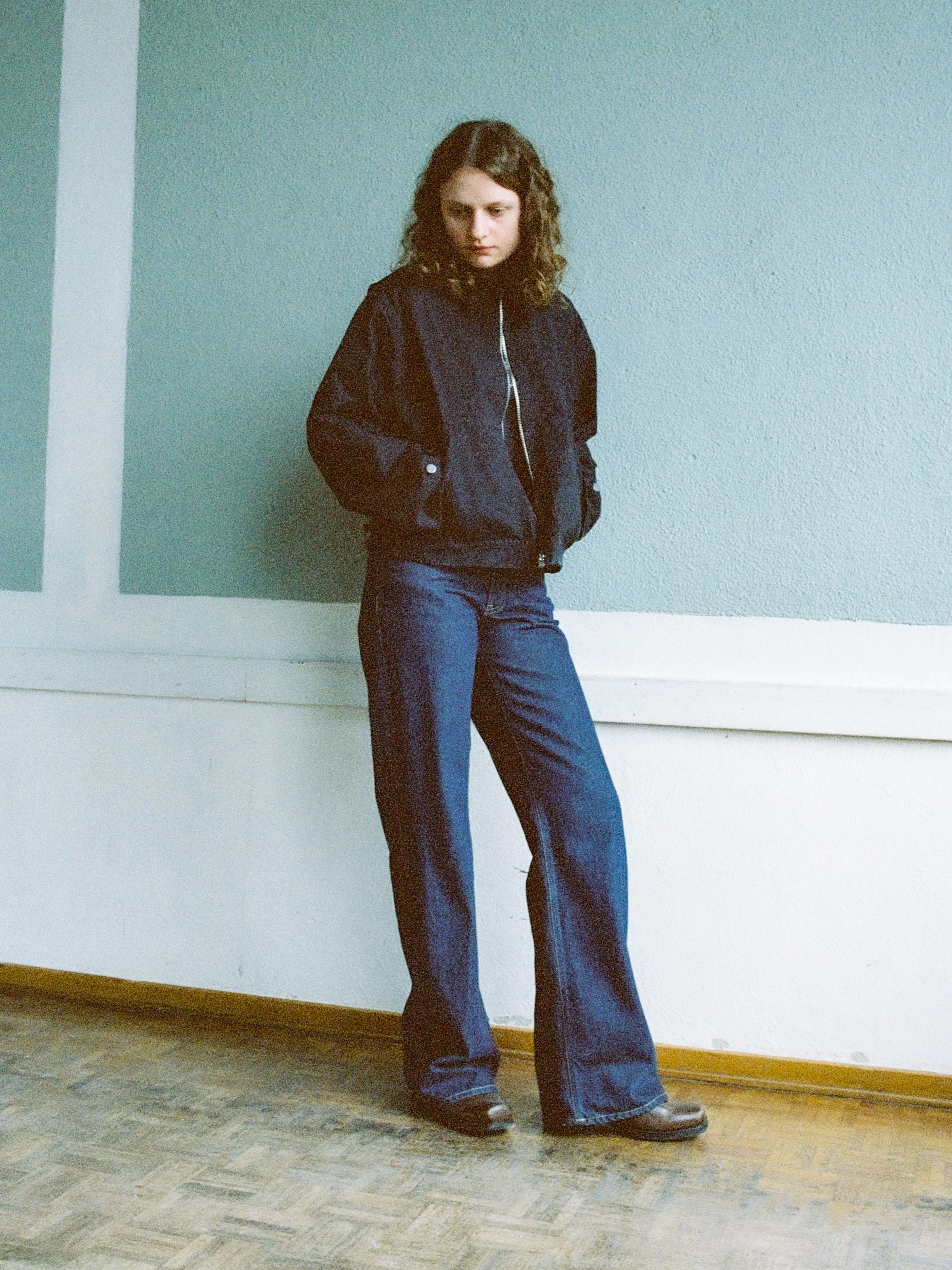 Nudie Jeans Wide Heidi Classic Blue, women's wide leg loose fit jeans in dark blue rigid denim shown on a model.