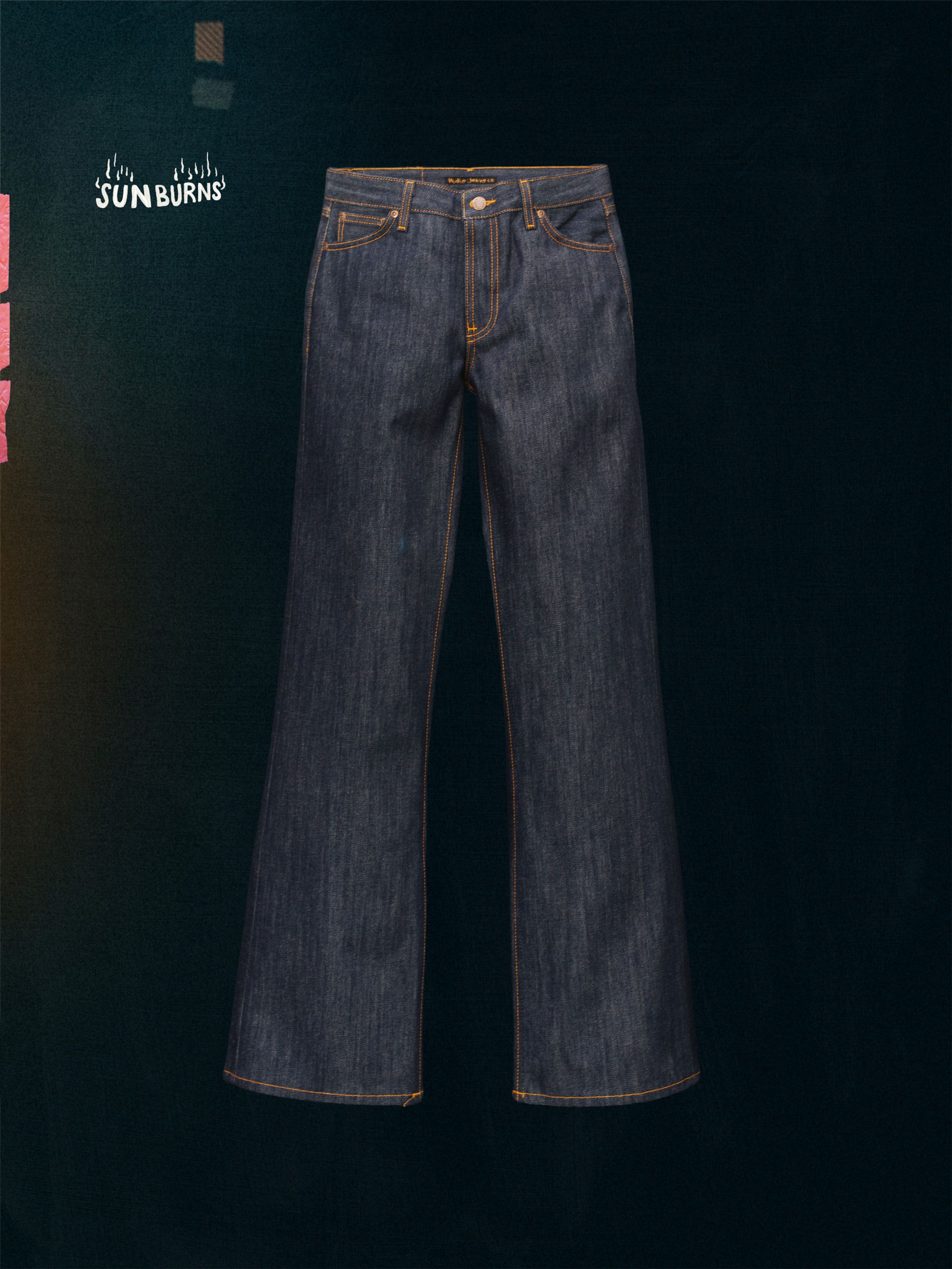 Nudie Jeans Wide Heidi Dry Sunburns, a pair of women's loose fit wide leg jeans in dry blue denim, shown laid flat.