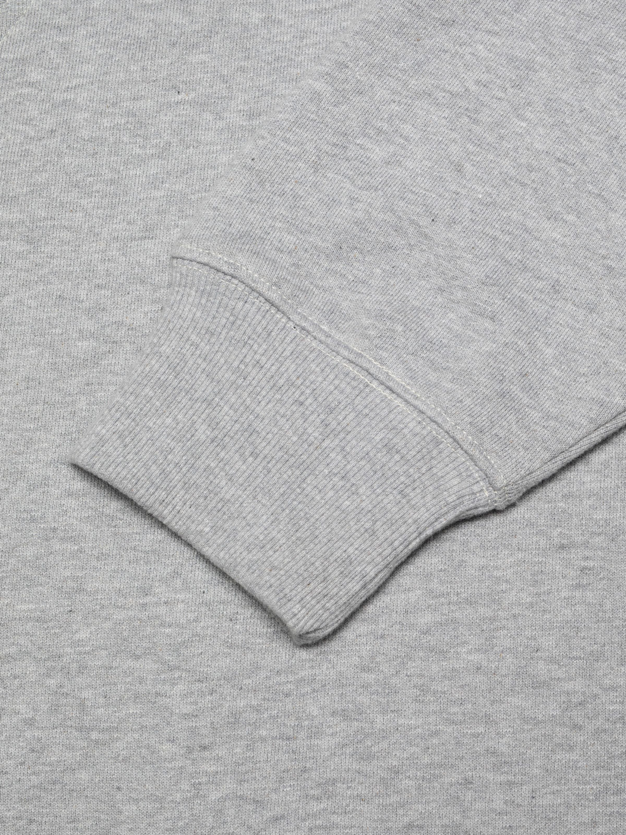 Nudie Jeans Gunde Logo Hoodie in Greymelange, close-up of the ribbed sleeve cuff.