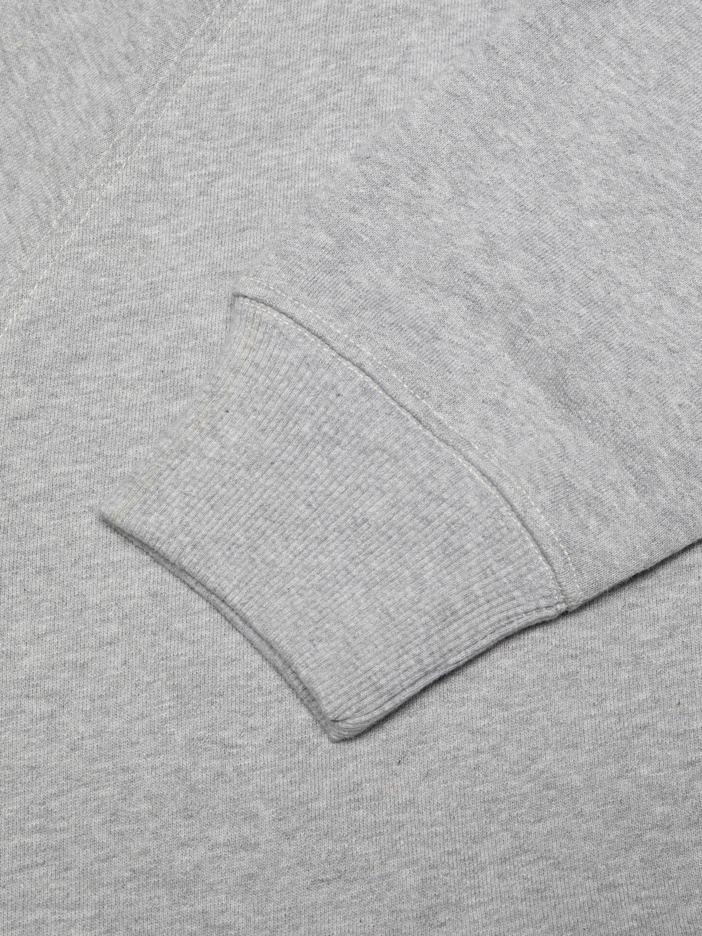 Nudie Jeans Gunde Logo Zip Hoodie in Greymelange, men's zip hoodie, showing a close-up of the ribbed cuff.