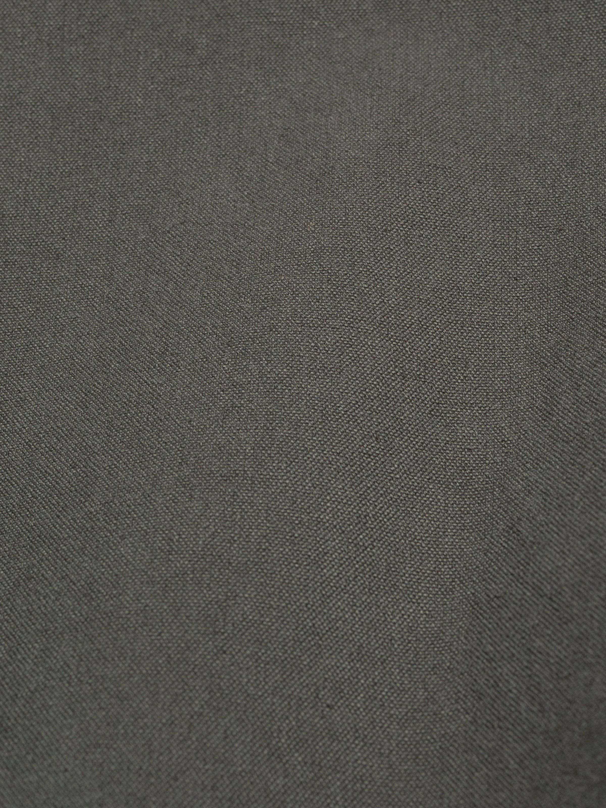 Nudie Jeans Blake Zip Jacket Duck Canvas in Green, a close-up of the rigid duck canvas fabric.