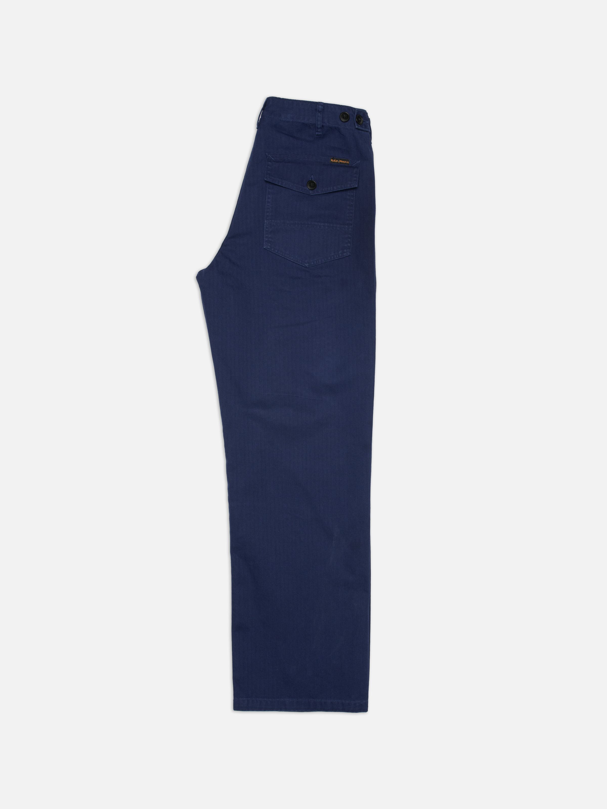 Nudie Jeans Tuff Tony Pants Deep Blue, men's loose fit pants in herringbone twill, shown laid flat and folded.
