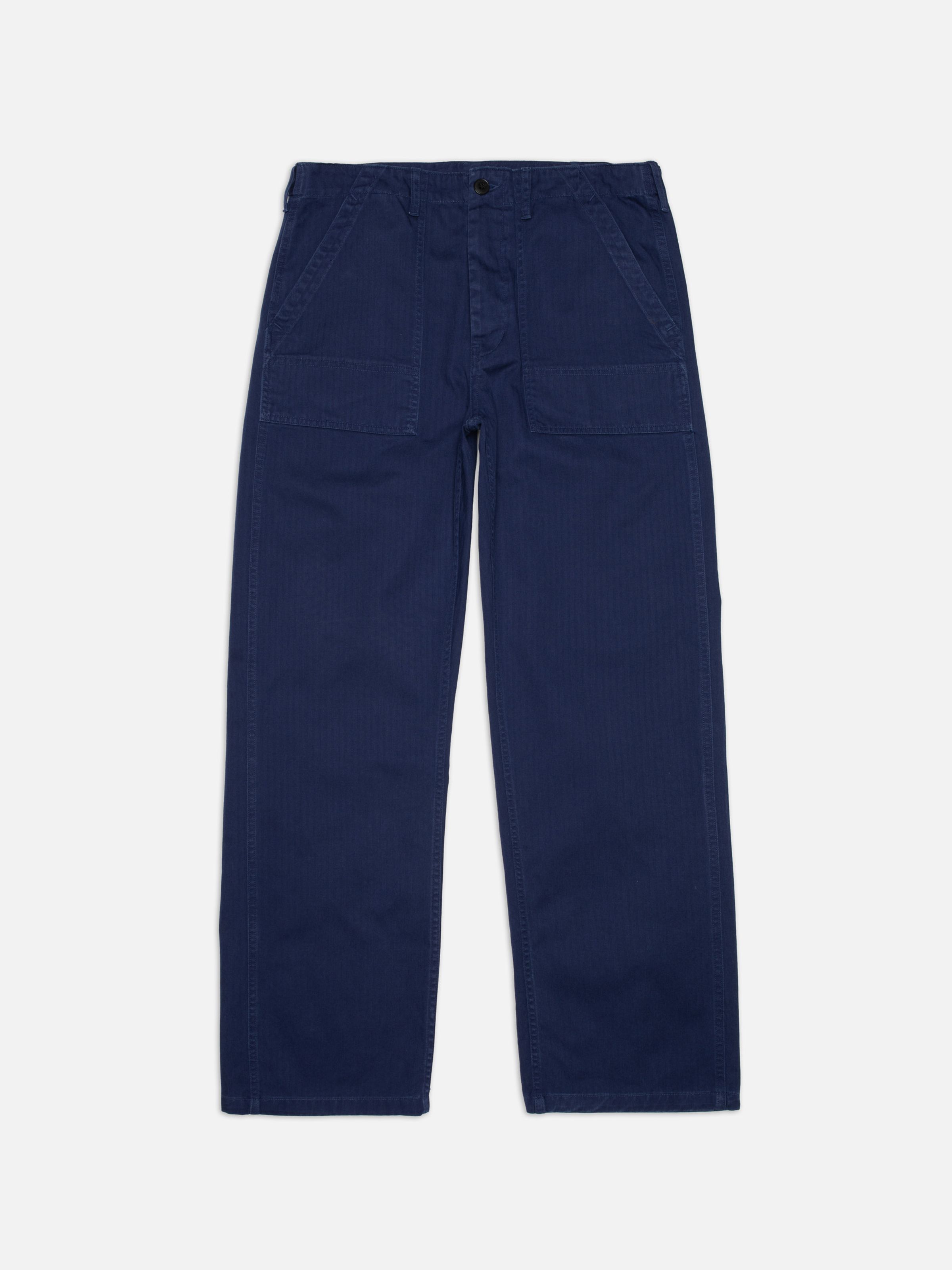 Nudie Jeans Tuff Tony Pants Deep Blue, a pair of men's loose fit pants in deep blue herringbone twill, shown laid flat.