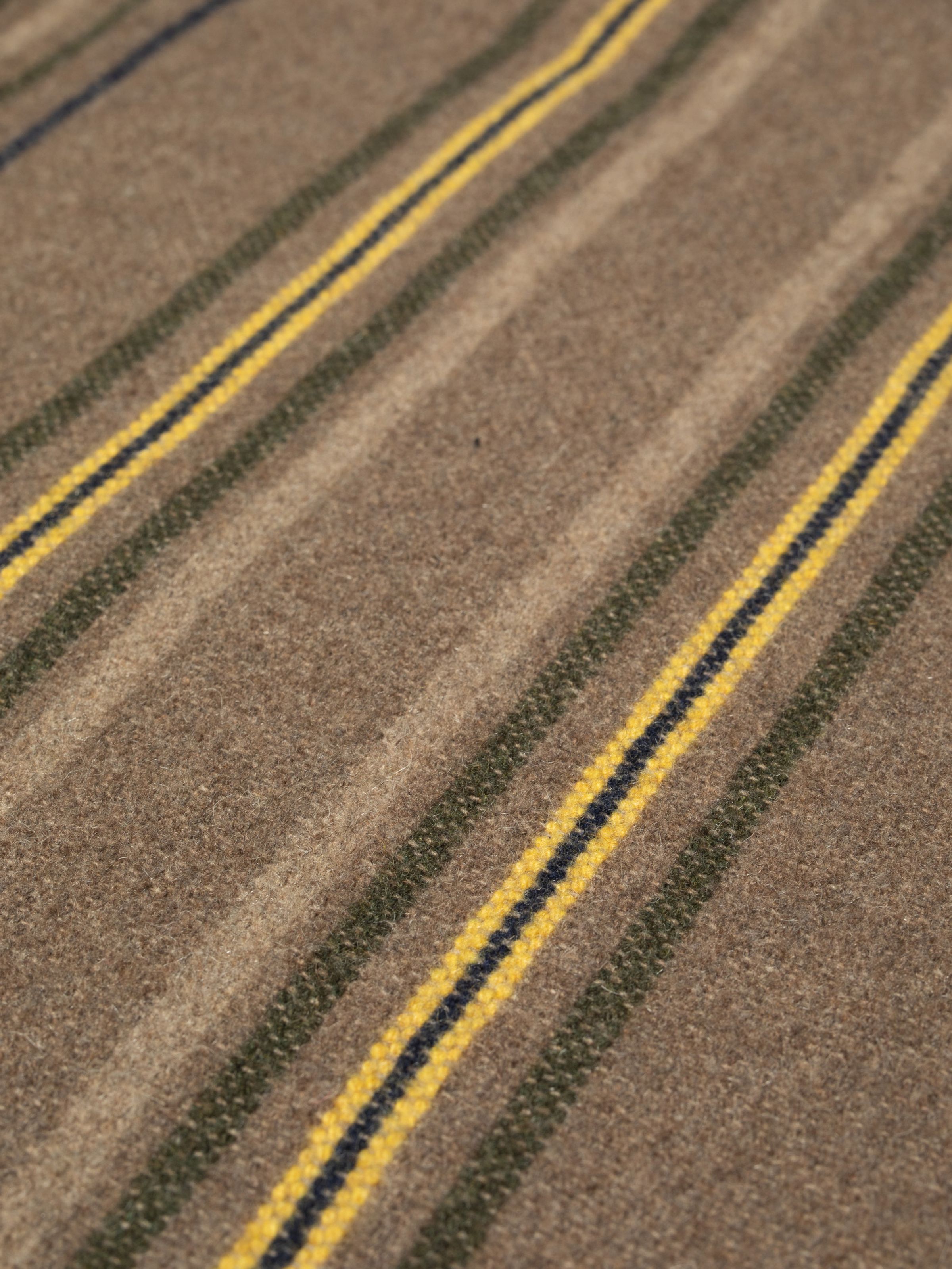 Nudie Jeans Blake Zip Jacket Duck Canvas in black, with a close-up shot of the striped wool-mix blanket lining.