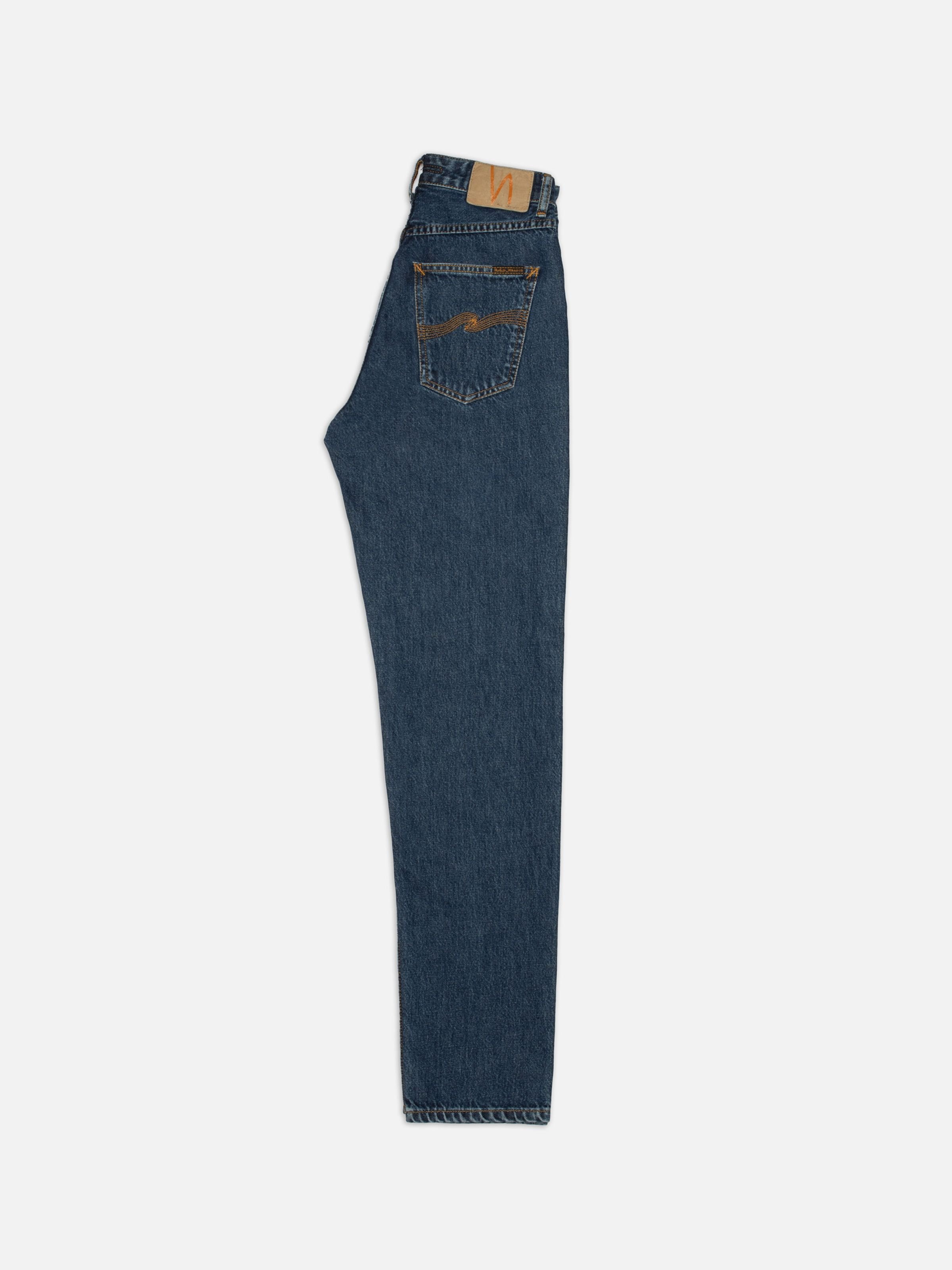 Nudie Jeans Breezy Britt Evening Jazz, women's regular tapered jeans in dark blue denim, shown laid flat and folded.