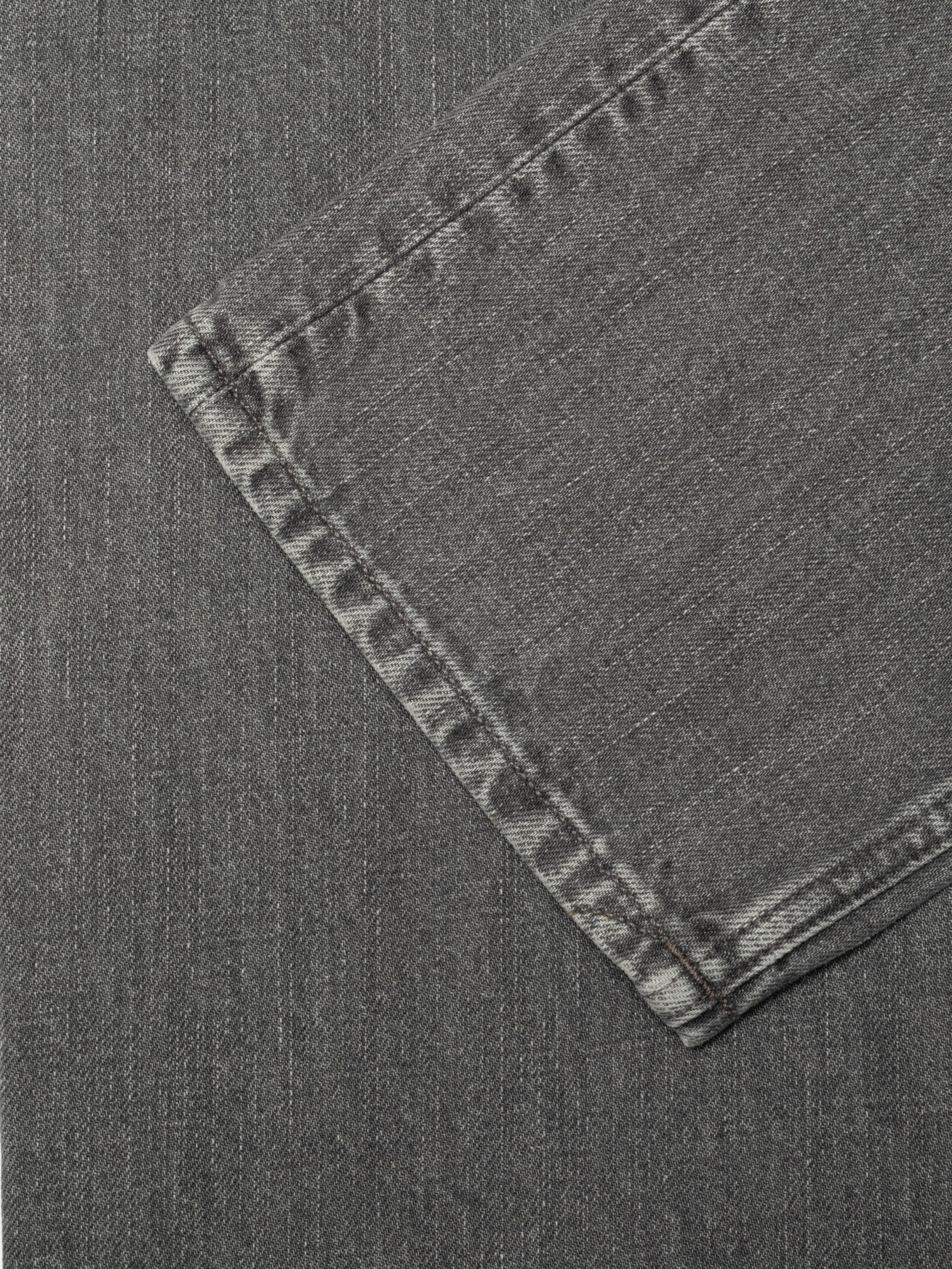 Nudie Jeans Lofty Lo Foggy Grey, women's straight leg jeans, showing a close-up of the pocket and grey denim fabric.