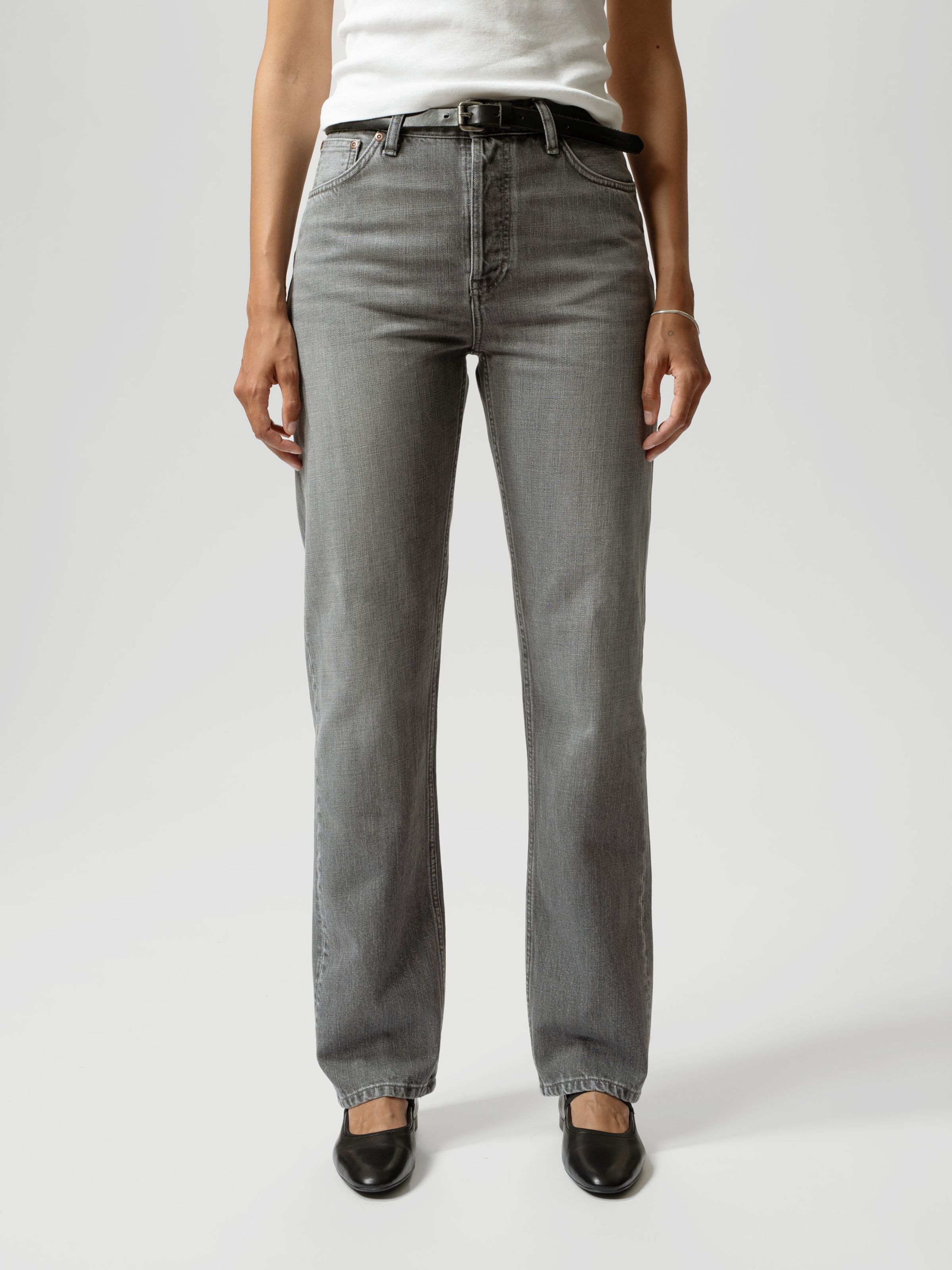 Nudie Jeans Lofty Lo in Foggy Grey, a women's straight leg jean worn by a model and shown from the front.