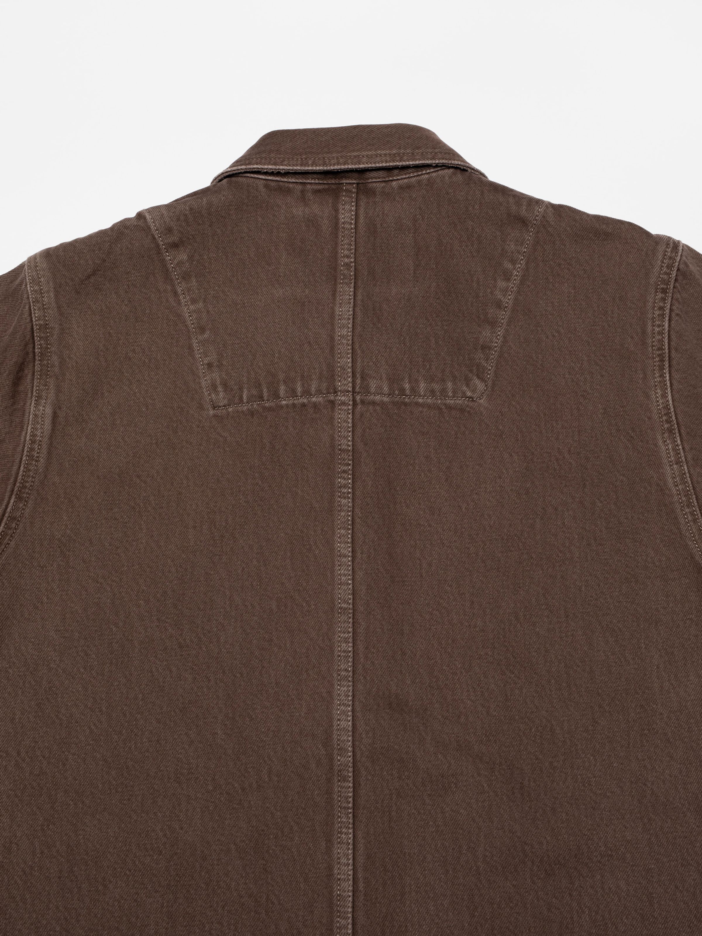 Nudie Jeans Ada Workwear Jacket Espresso, a women's jacket in espresso brown, showing a close-up of the back collar and yoke.
