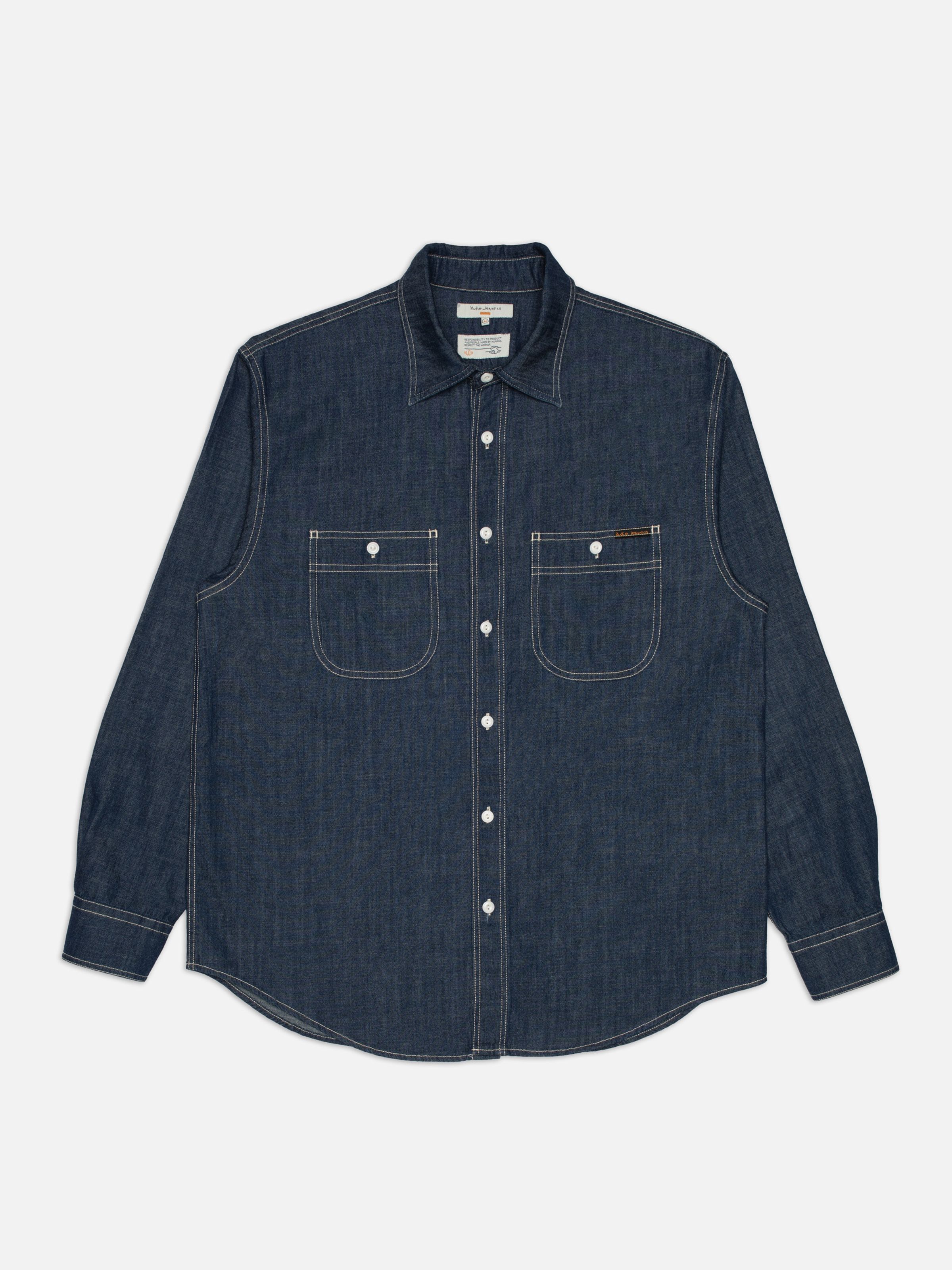 Nudie Jeans Julian Denim Shirt Rinsed, men's long-sleeve denim shirt in Rinsed Blue, laid flat.