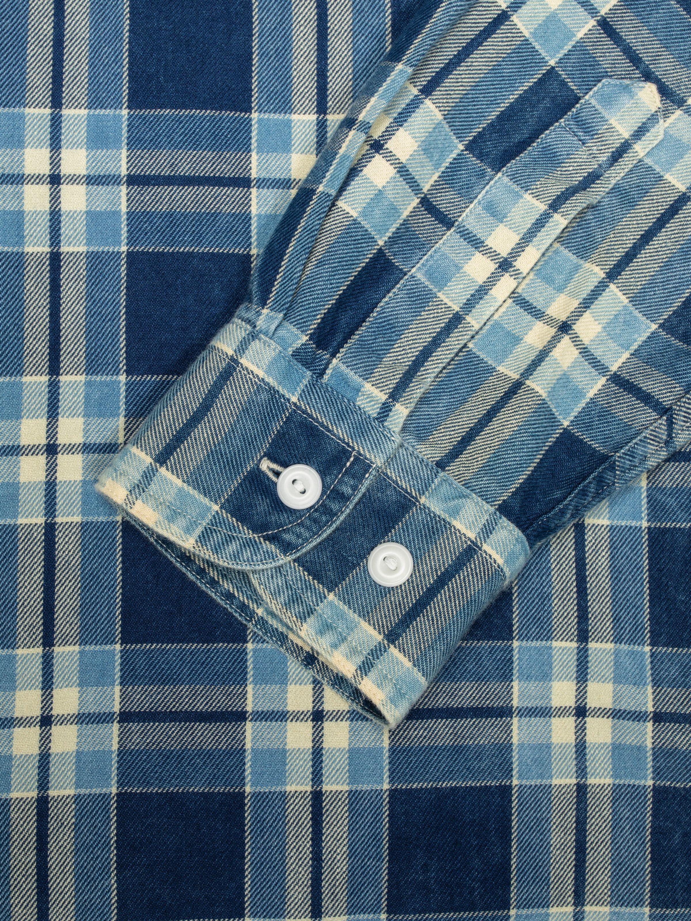Nudie Jeans Julian Worker Shirt Checked, men's shirt in checked indigo, showing a close-up of the sleeve cuff.