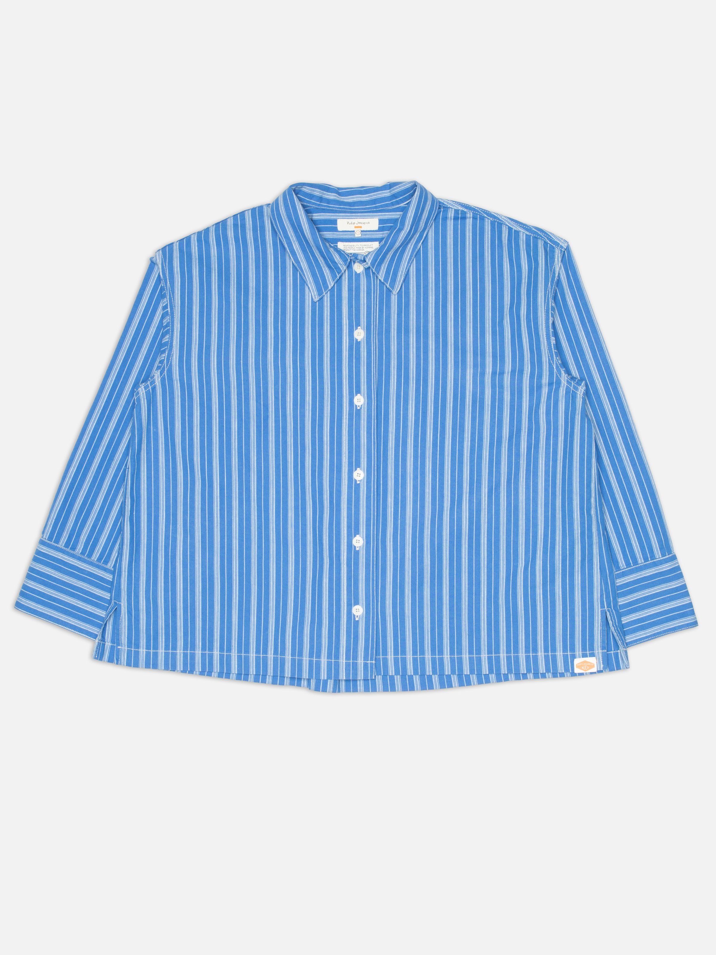 Nudie Jeans Jutta Shirt Striped, women's relaxed fit long-sleeved shirt in blue and off-white stripes, shown laid flat.