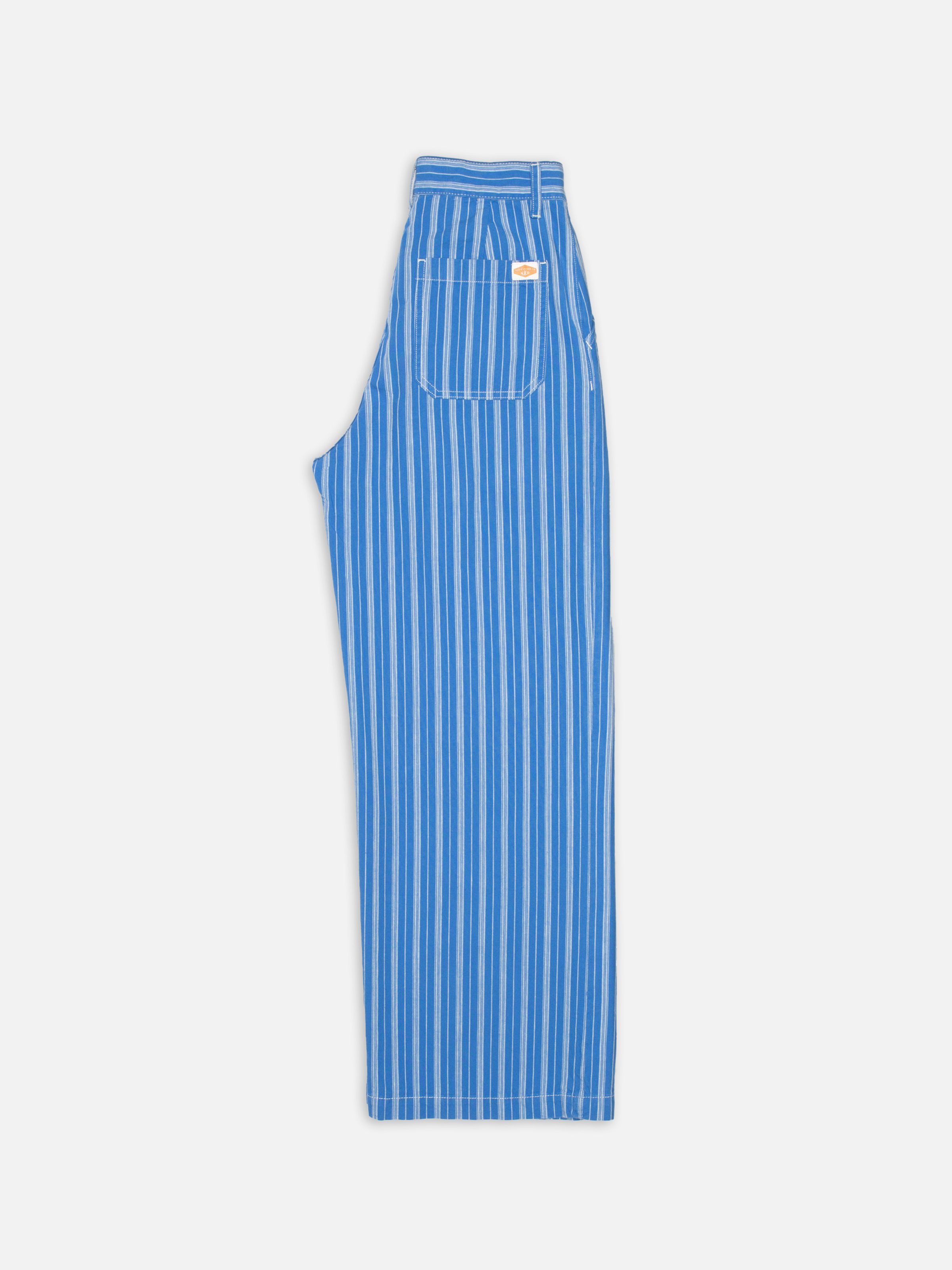 Nudie Jeans Gullan Pants Striped, women's loose fit pants folded to show the side profile and back pocket.