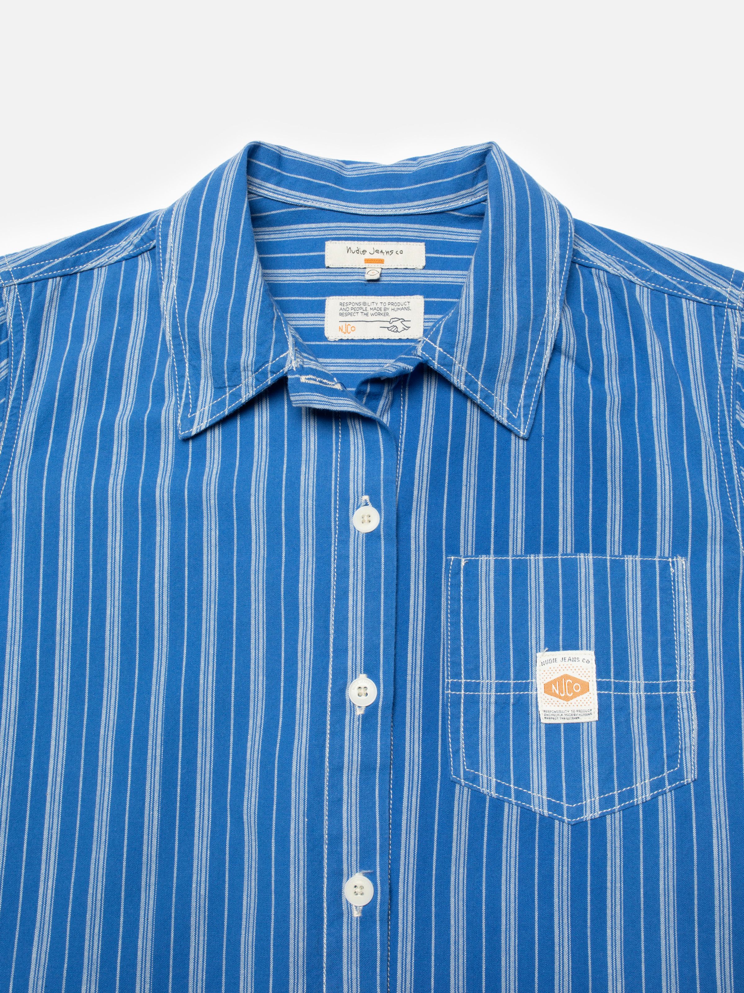 Nudie Jeans Danielle Dress Striped, women's blue and off-white shirt dress, close-up of the collar and chest pocket.