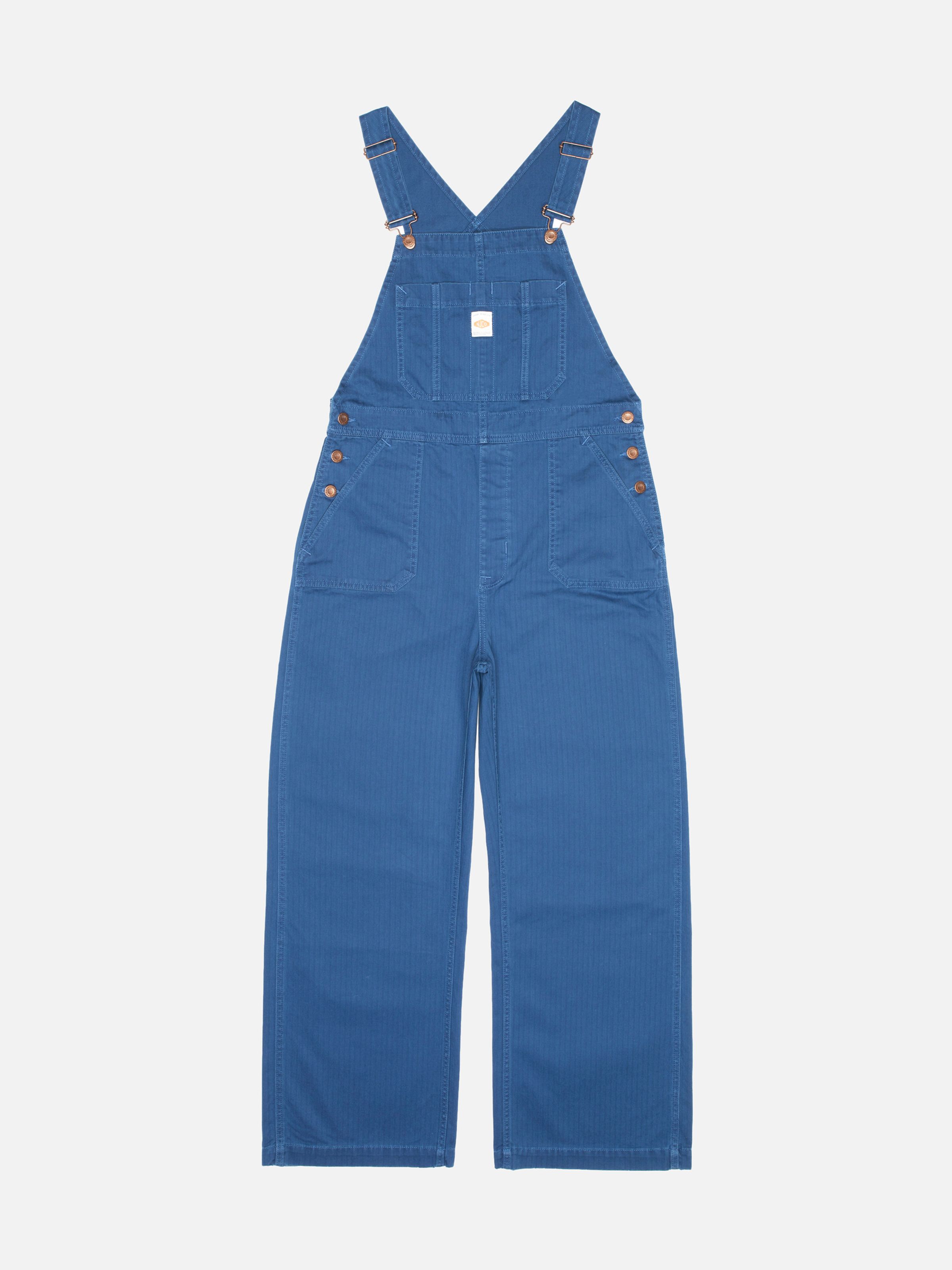 Nudie Jeans Klara Dungarees Herringbone, women's dungarees in blue herringbone twill, laid flat, seen from the front.