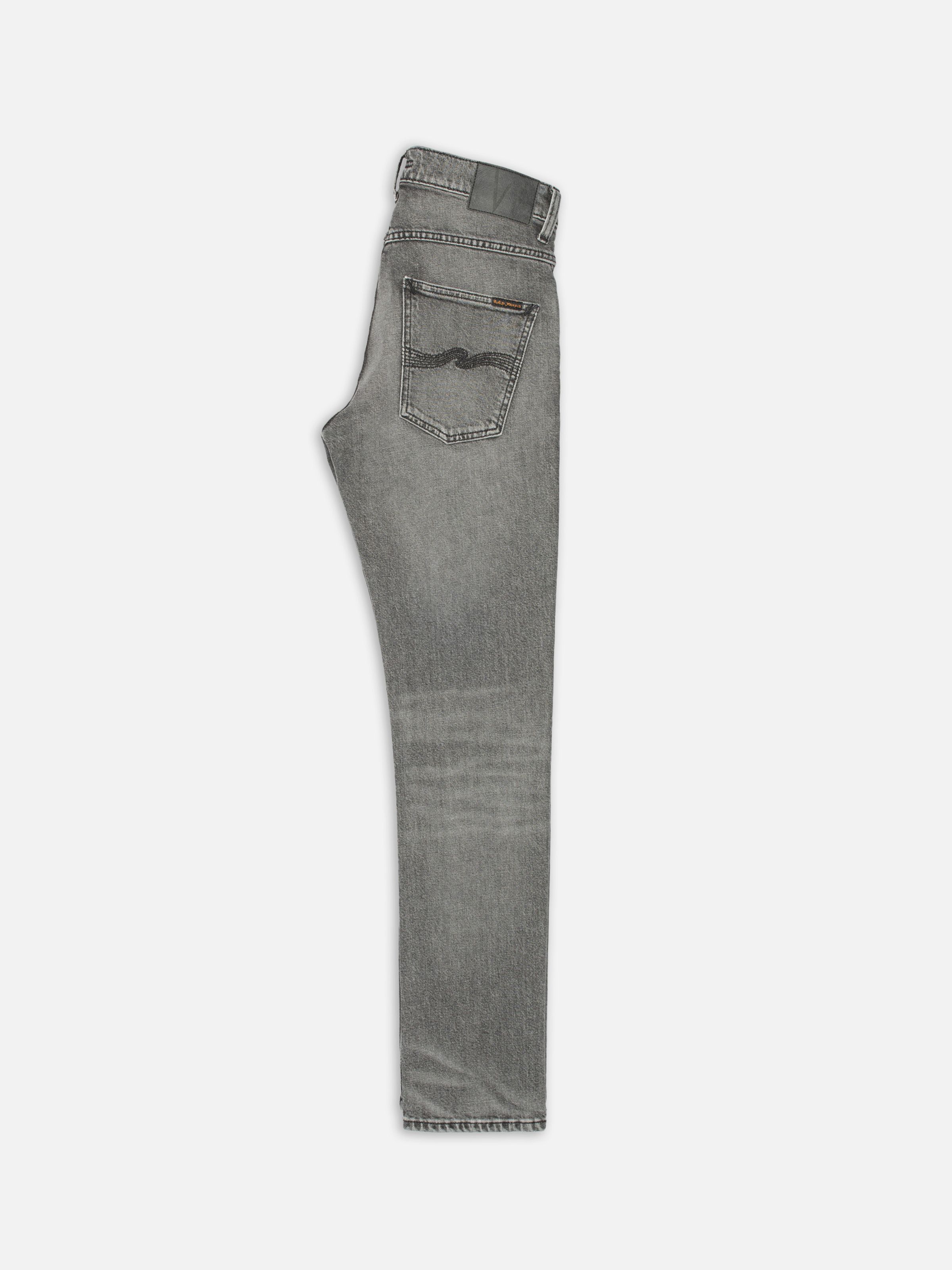 Nudie Jeans Grim Tim Cloud Grey, men's slim fit jeans, folded flat to show the back pocket.