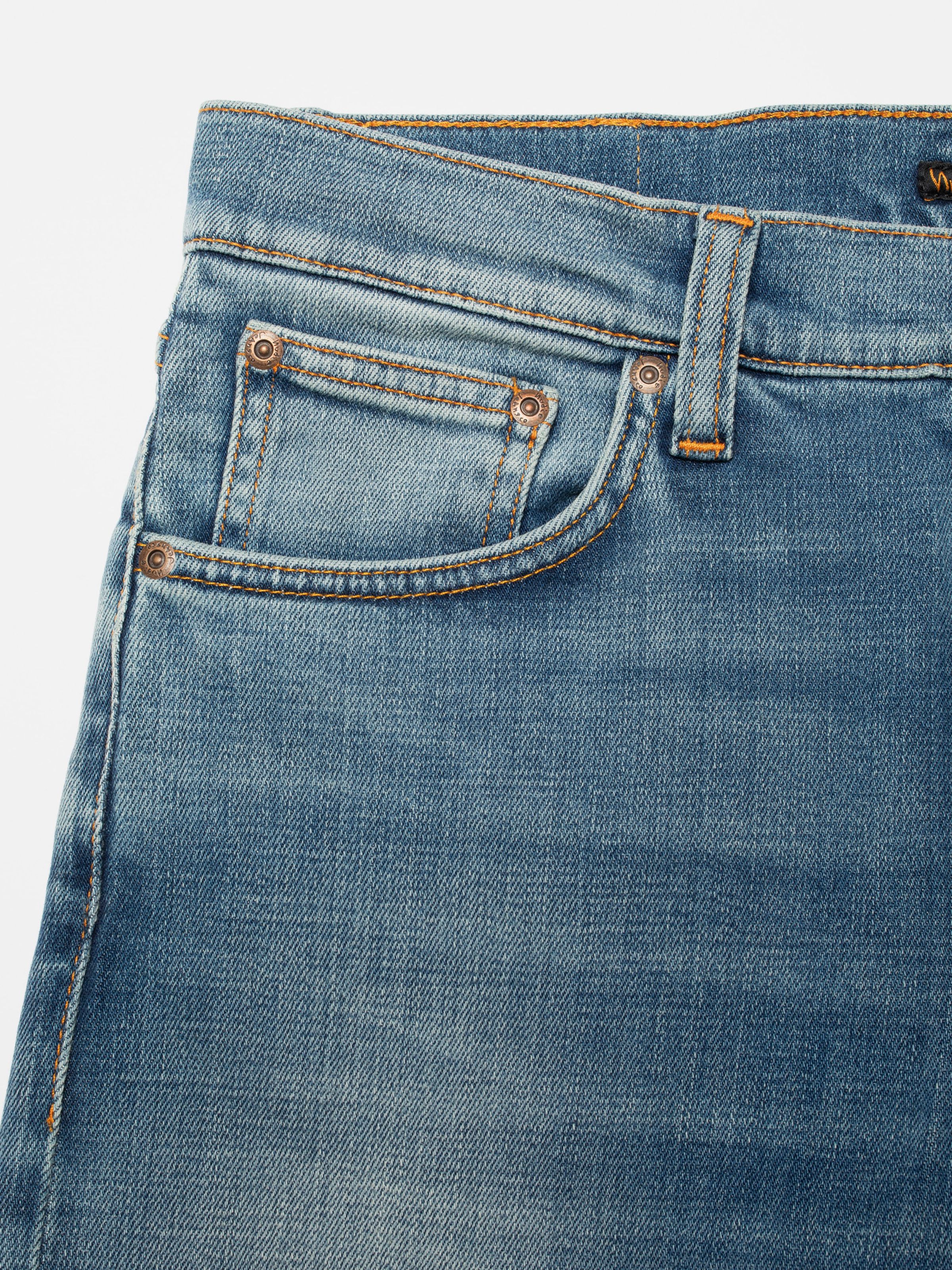 Nudie Jeans Lean Dean Blue Legend, men's slim tapered jeans, showing a close-up of the front pocket detail.