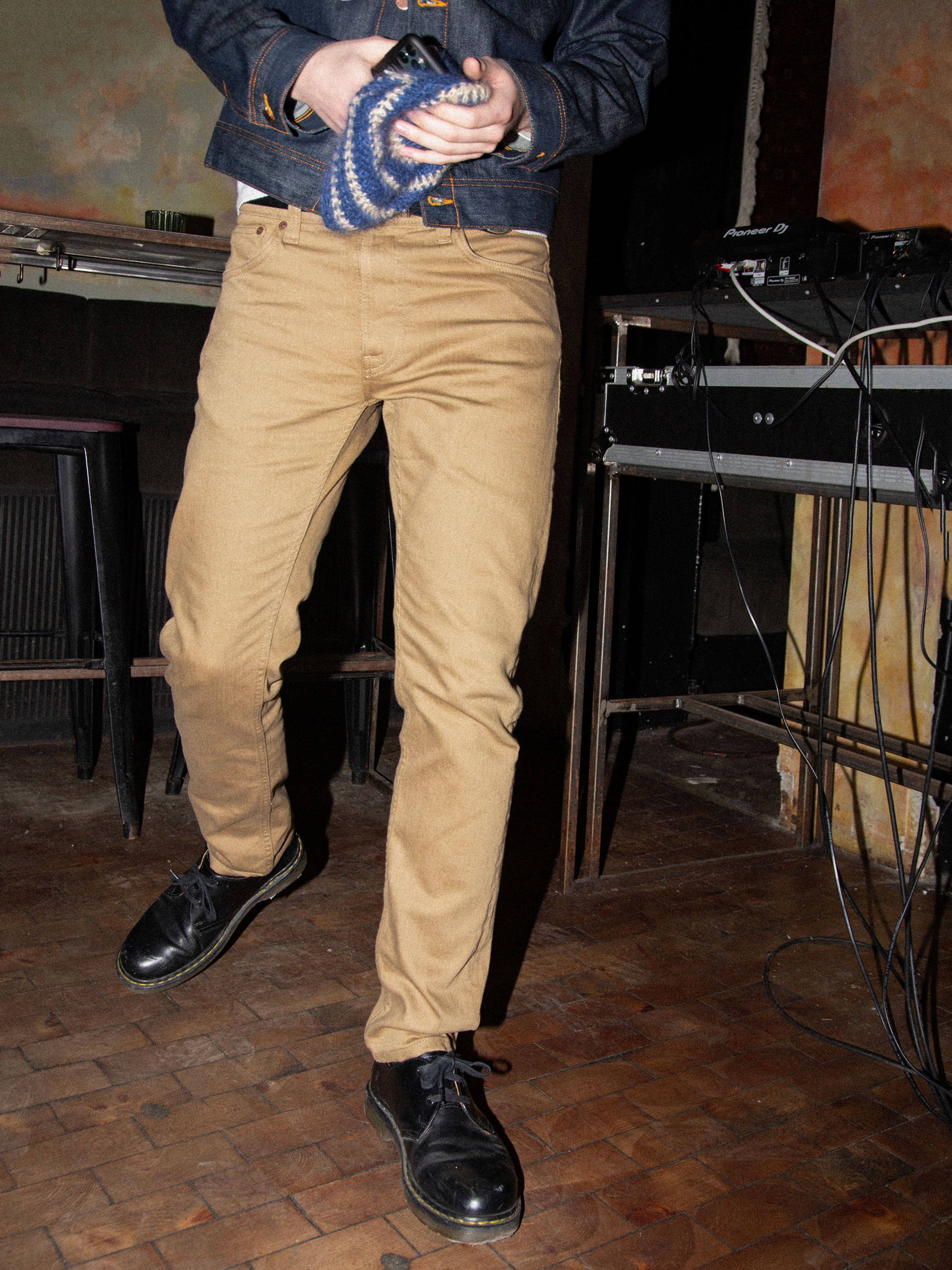 Nudie Jeans Lean Dean Everlion, men's slim tapered jeans shown on a person in a casual setting.