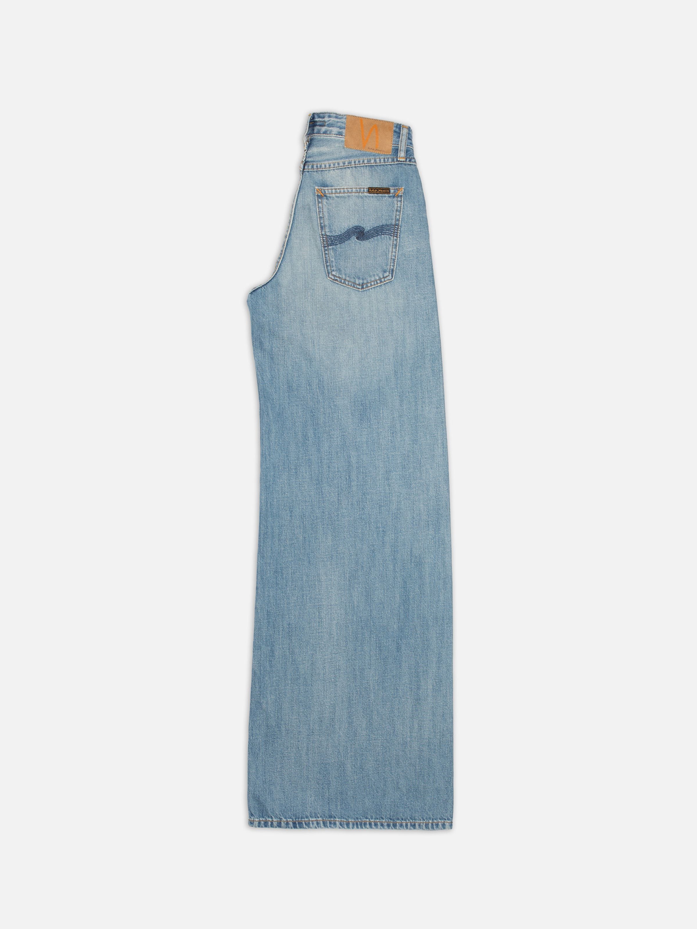 Nudie Jeans Sonic Sue Blue Wave, women's loose fit A-line jeans, folded flat to display the back pocket and jacron patch.