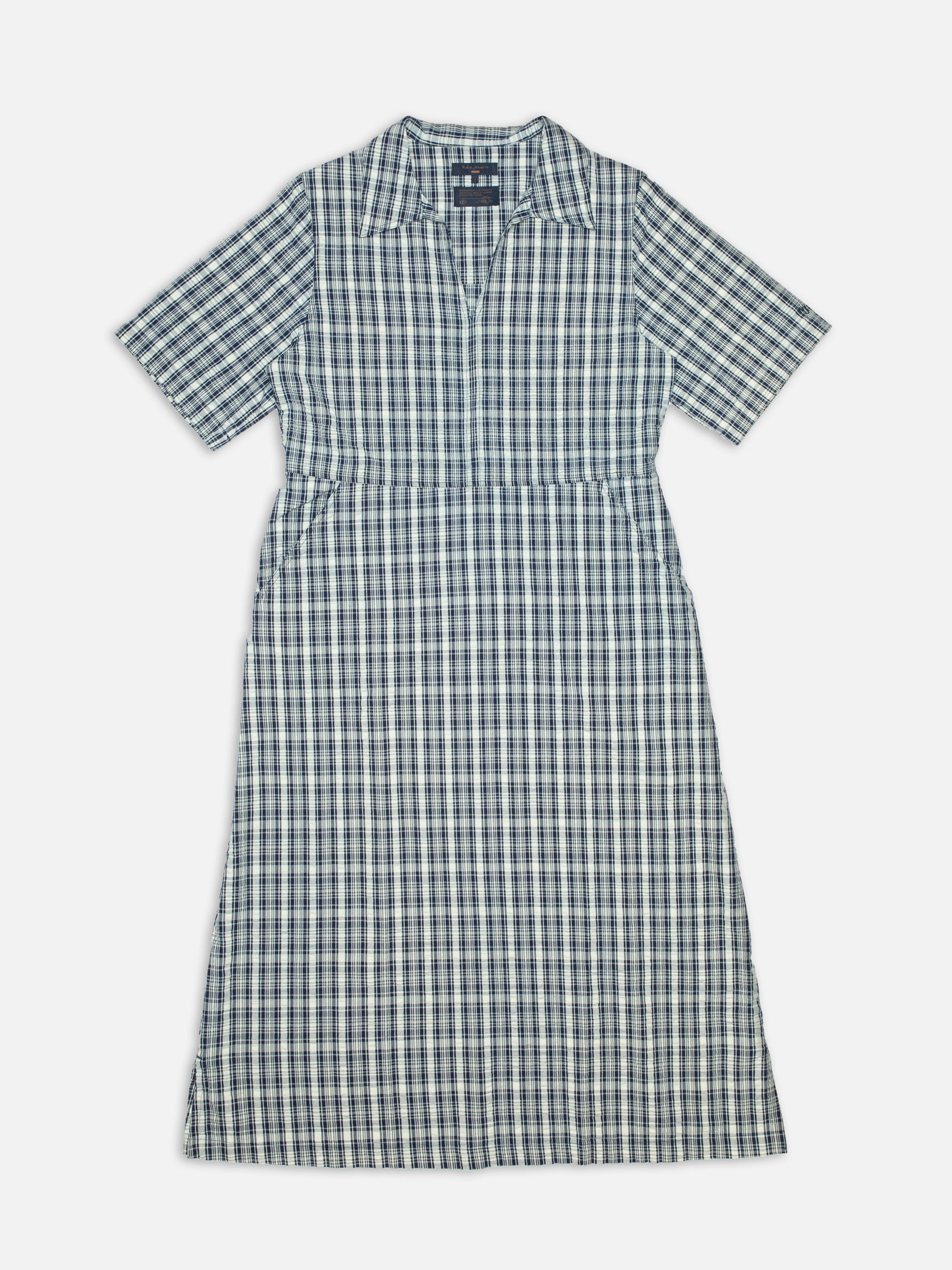 Nudie Jeans Ronja Dress Indigo Seersucker, women's short-sleeved dress with an indigo check, full-length flat shot.