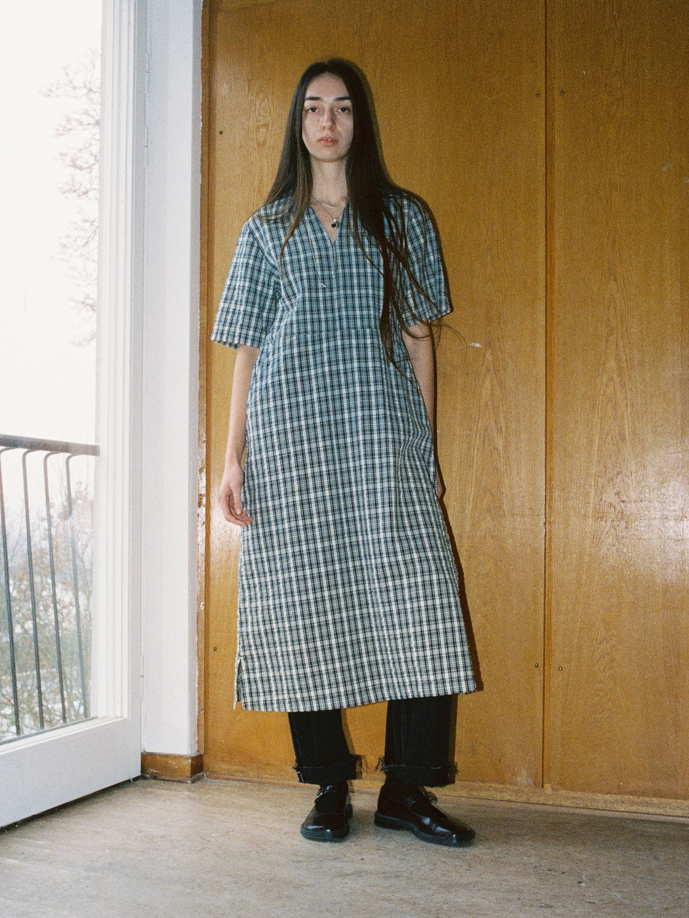 Nudie Jeans Ronja Dress Indigo Seersucker, women's short-sleeved dress shown from the front on a model.