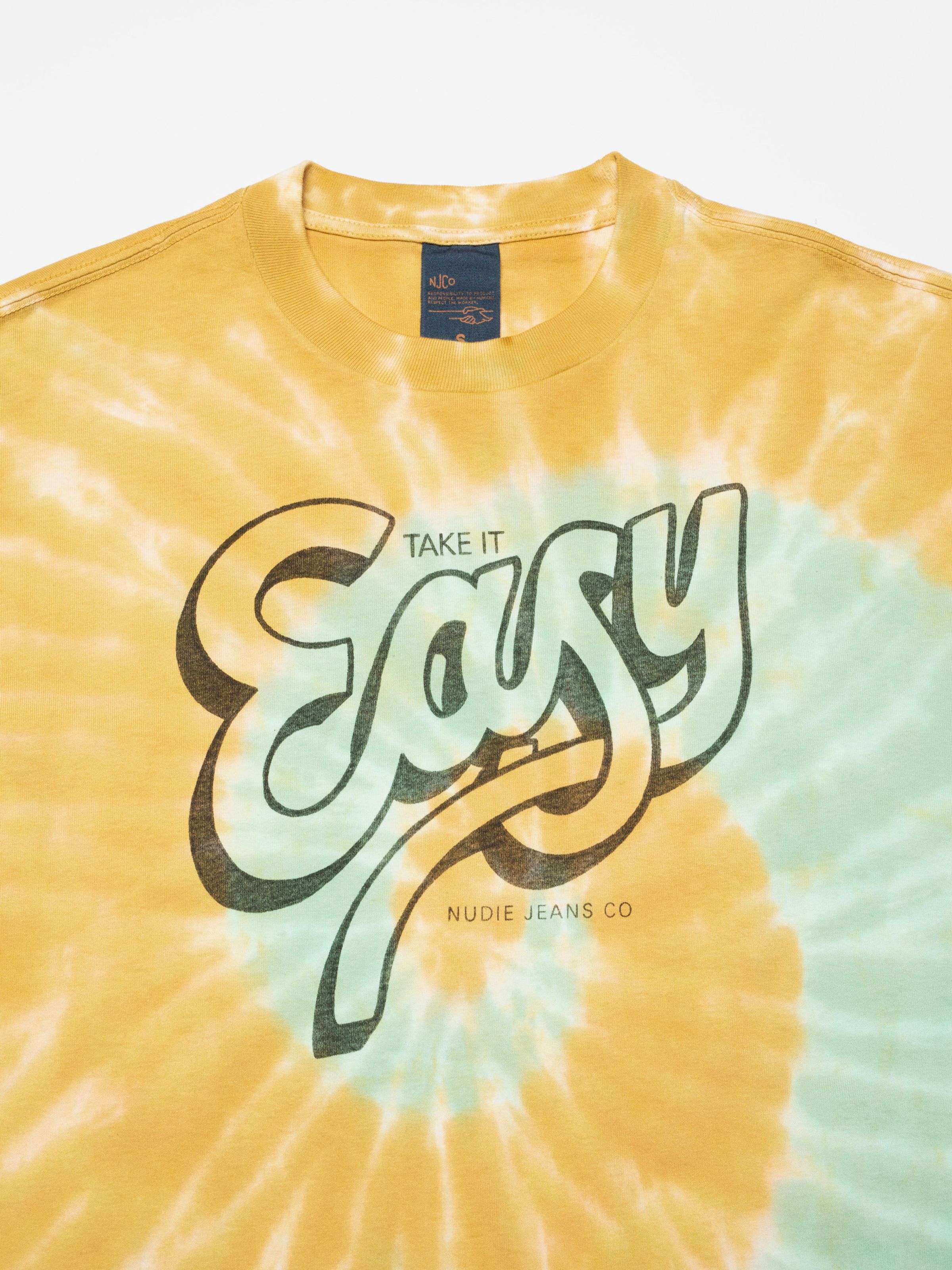 Nudie Jeans Rita T-Shirt Take It Easy, women's organic cotton tie-dye t-shirt shown in a close-up of the chest print.