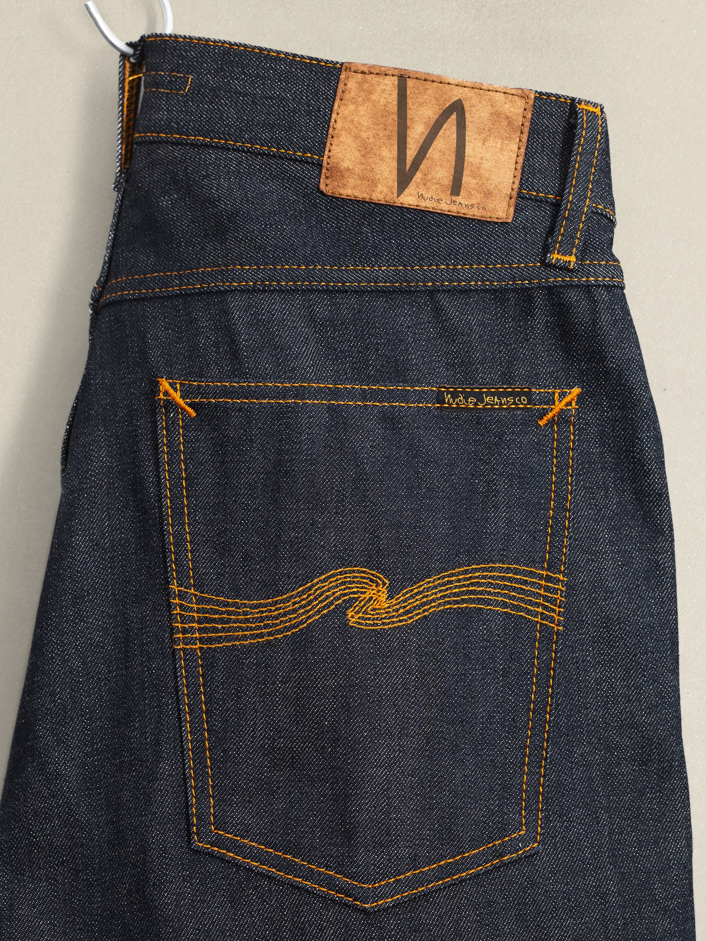 Nudie Jeans Regular Alf Dry Selvage, men's jeans, showing the back pocket and jacron patch.