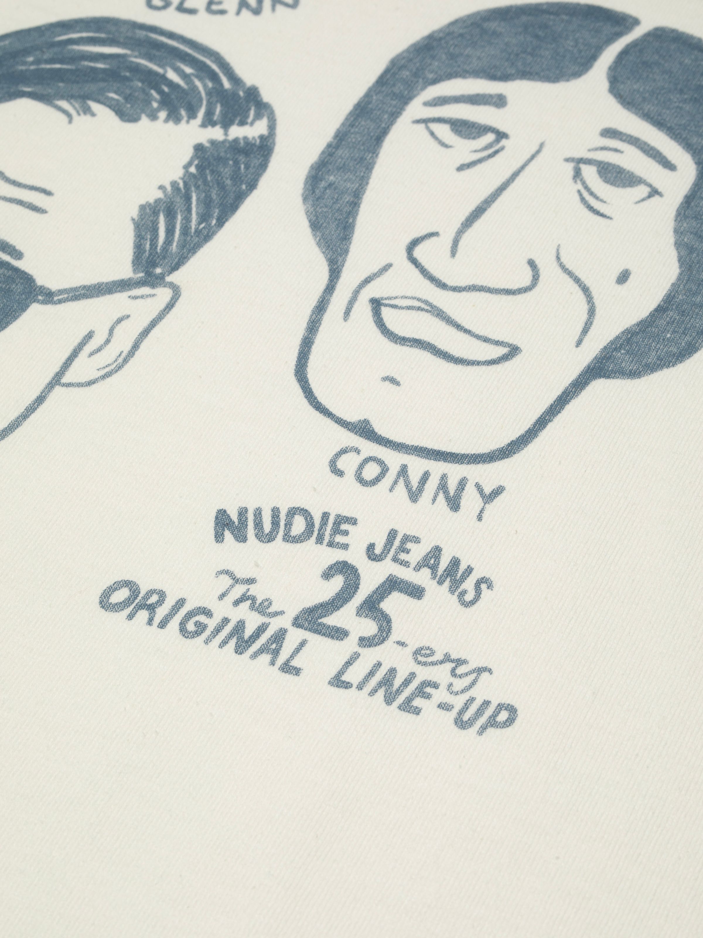 Nudie Jeans Roy T-Shirt Fab Four in Chalk White, close-up of the graphic print featuring the original denim fit lineup.